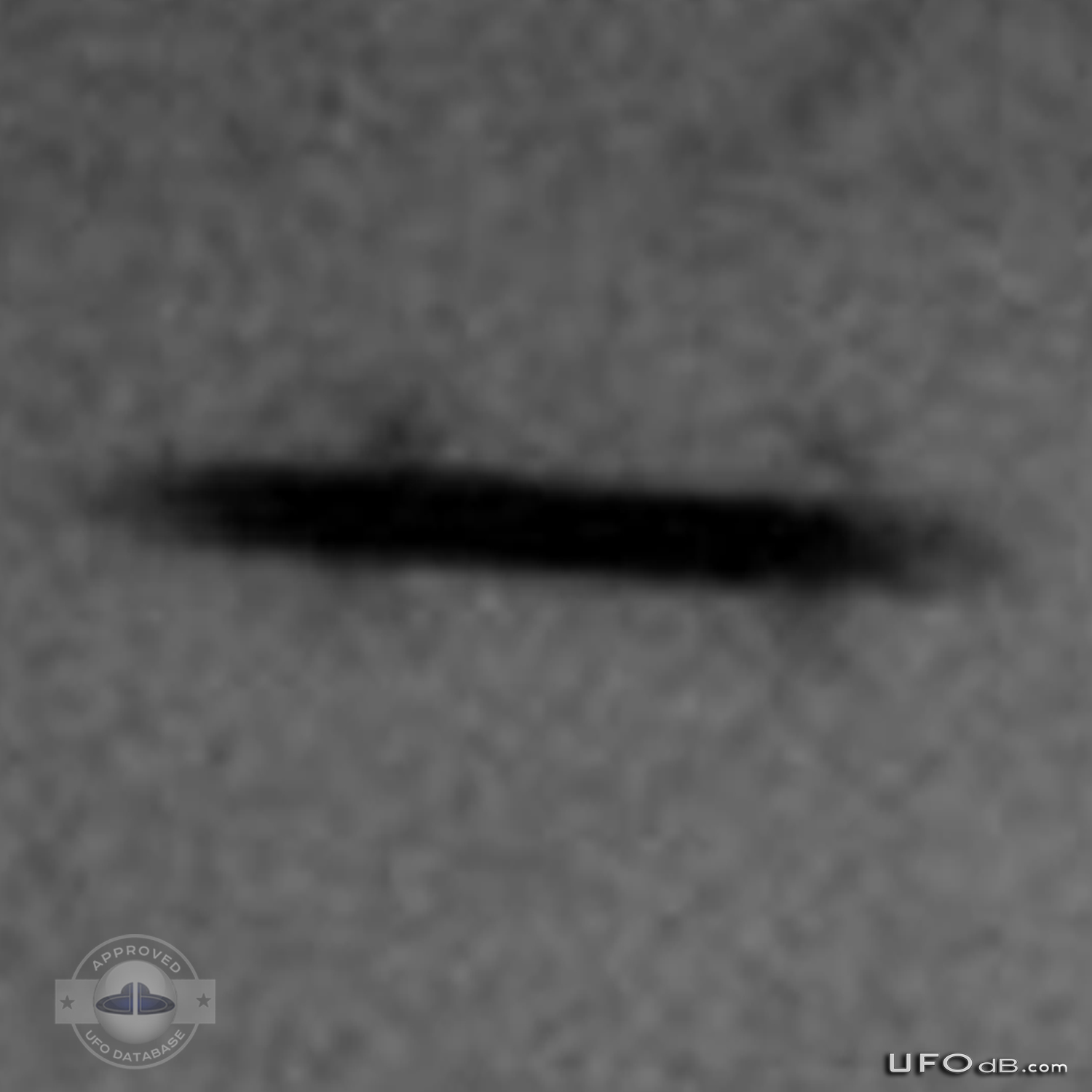 Dark Winged Saucer UFO over the town of Havant, England | April 7 2011 UFO Picture #263-5