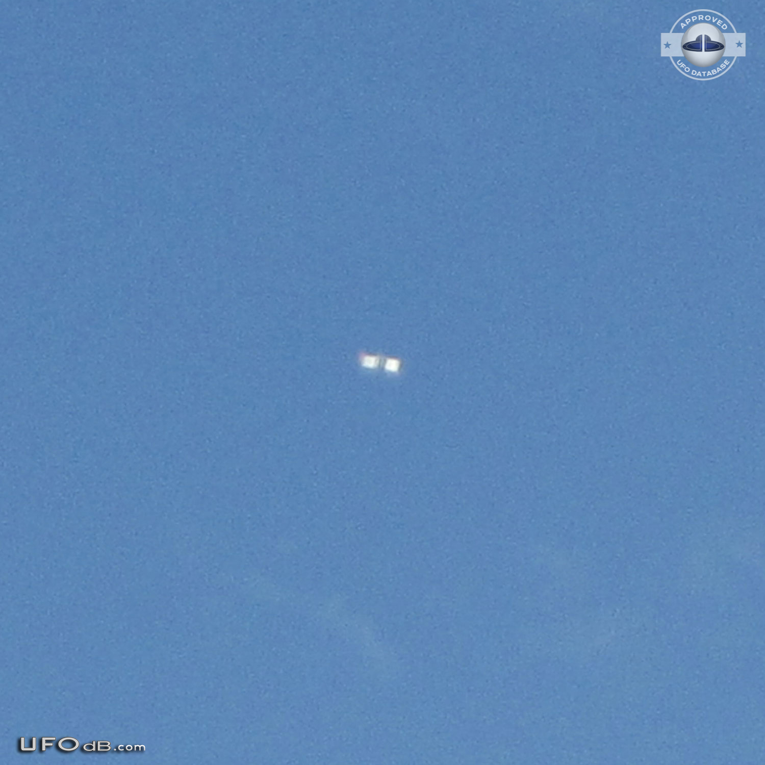 Woman and Son sees shinny square UFO in Sarasota Airport, Florida 2012 UFO Picture #520-1