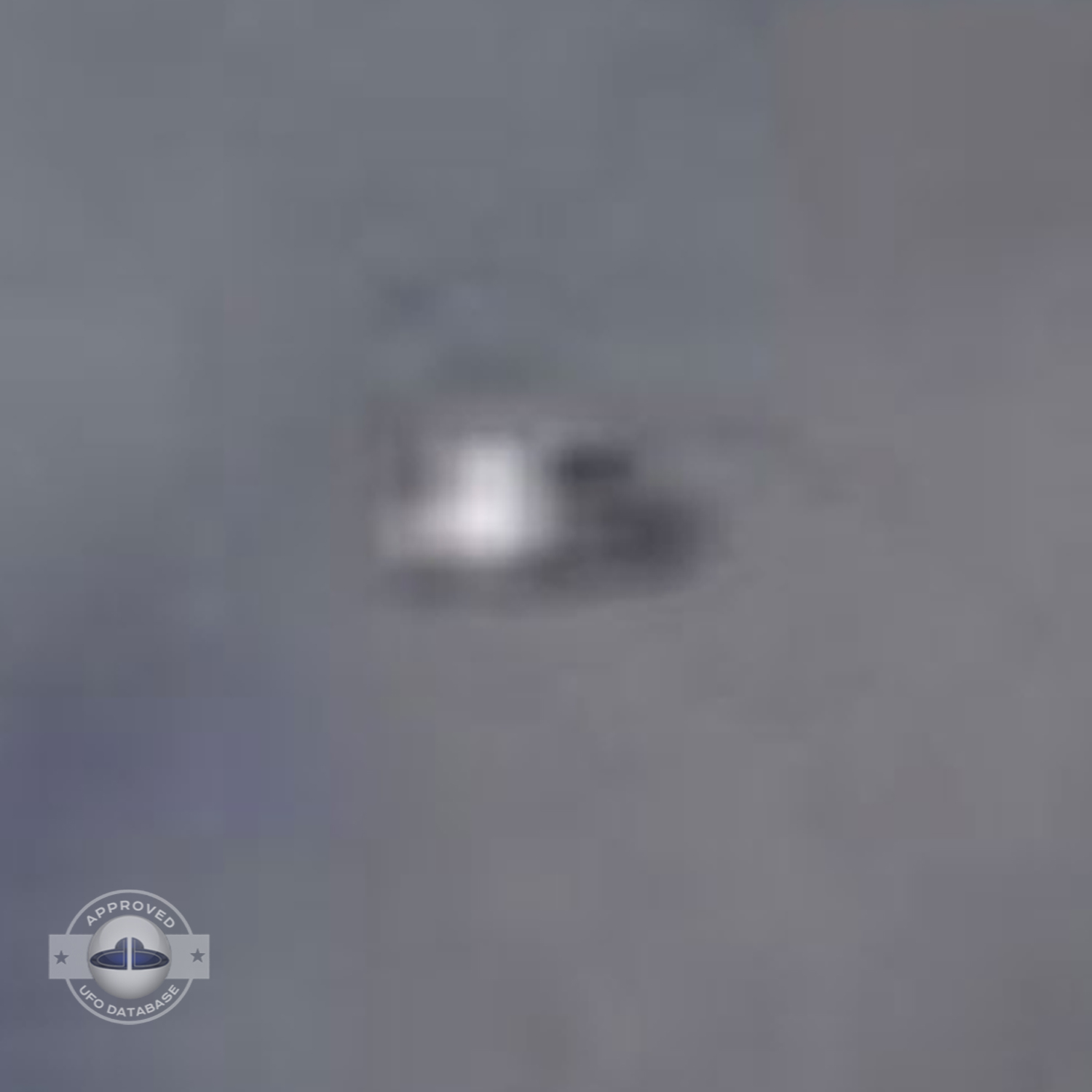 UFO over the country in Scotland during the day in a blue sky UFO Picture #15-4