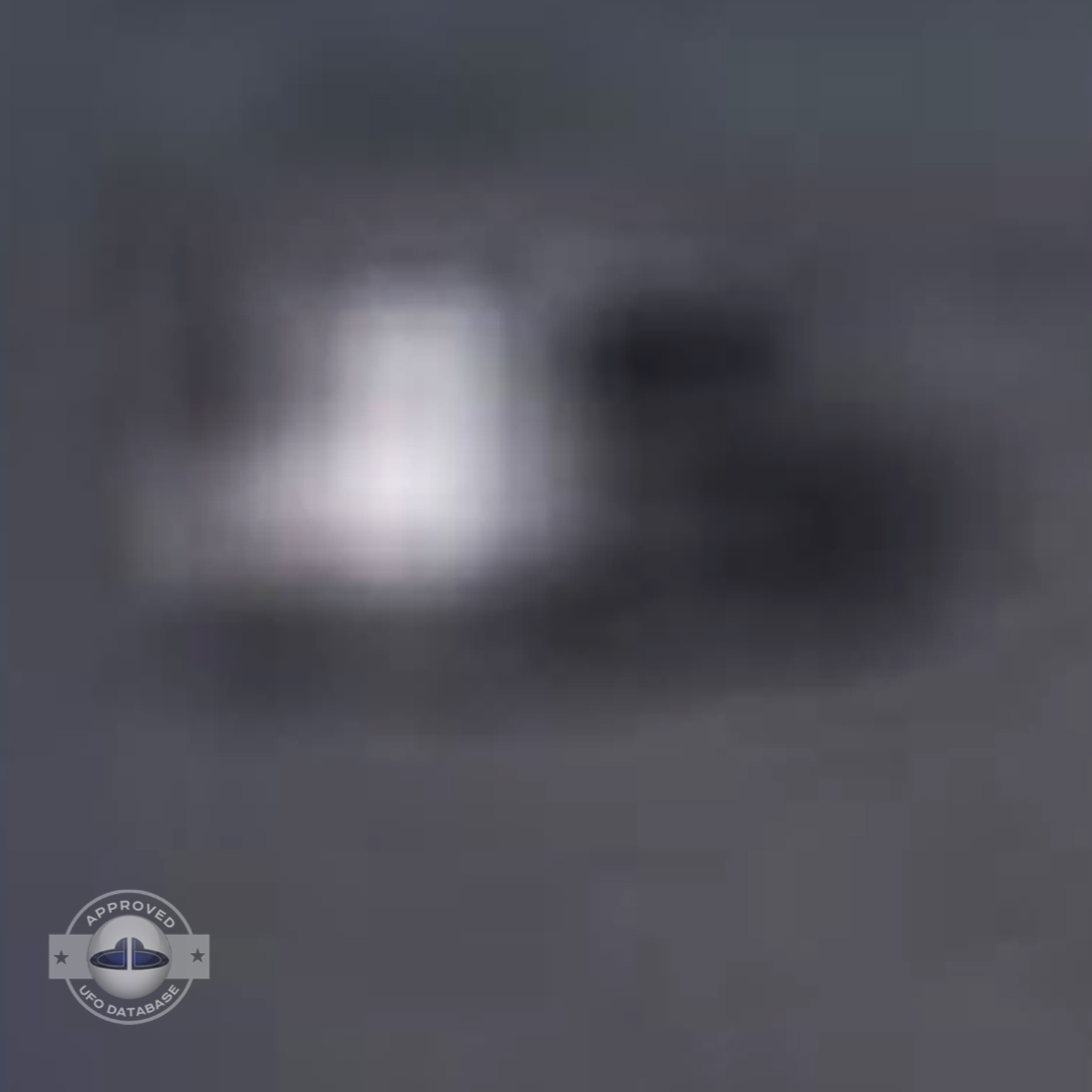 UFO over the country in Scotland during the day in a blue sky UFO Picture #15-6