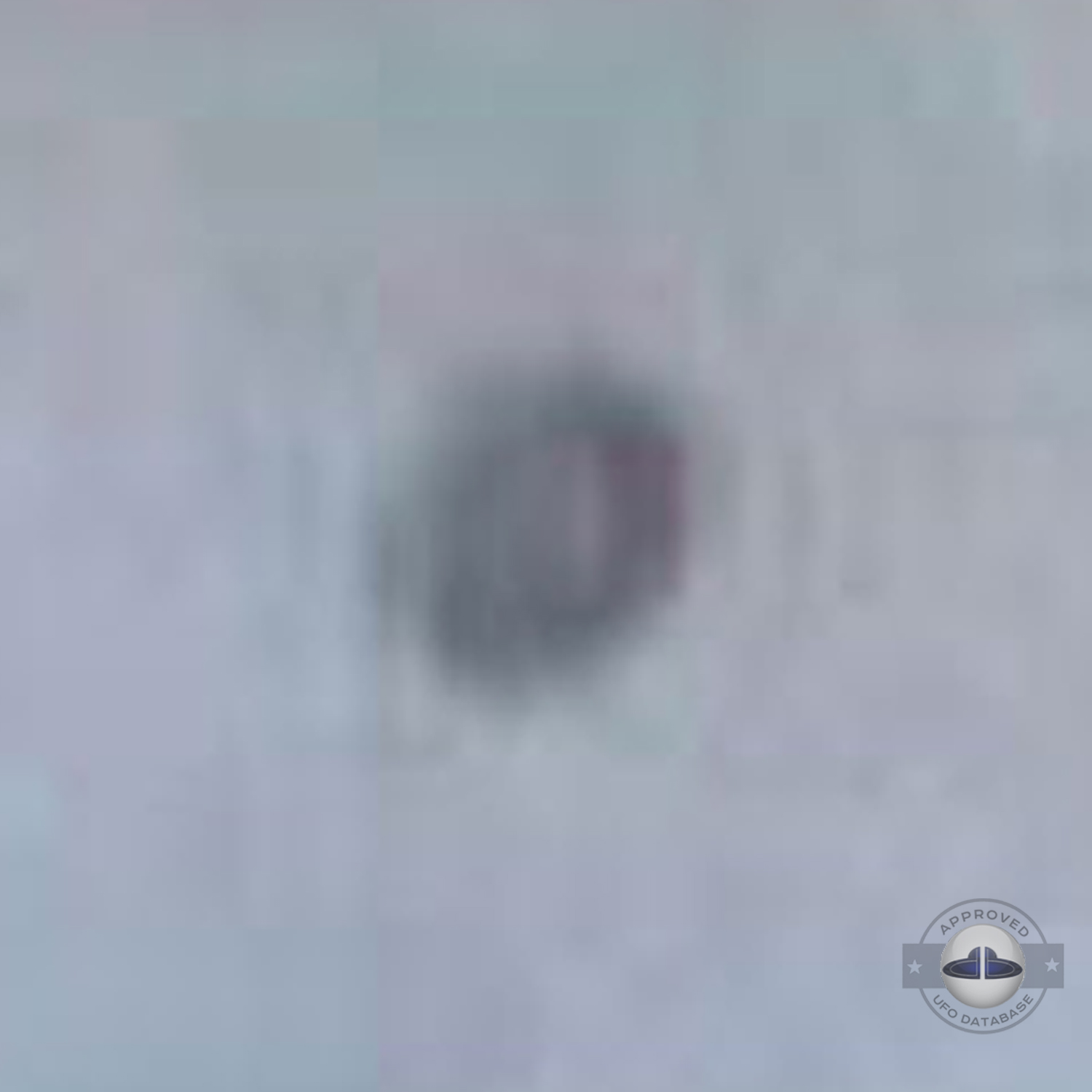 UFO Pictures UFOdB.com - UFO near airplane in England in 2002 UFO Picture #63-4