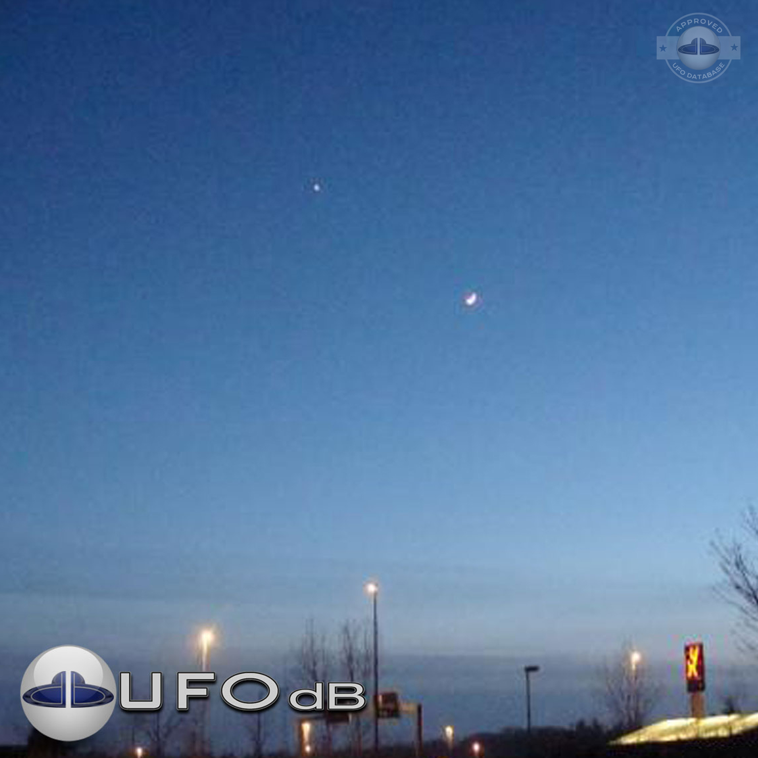UFO picture of a UFO over a city at night fall in Denmark UFO Picture #10-2