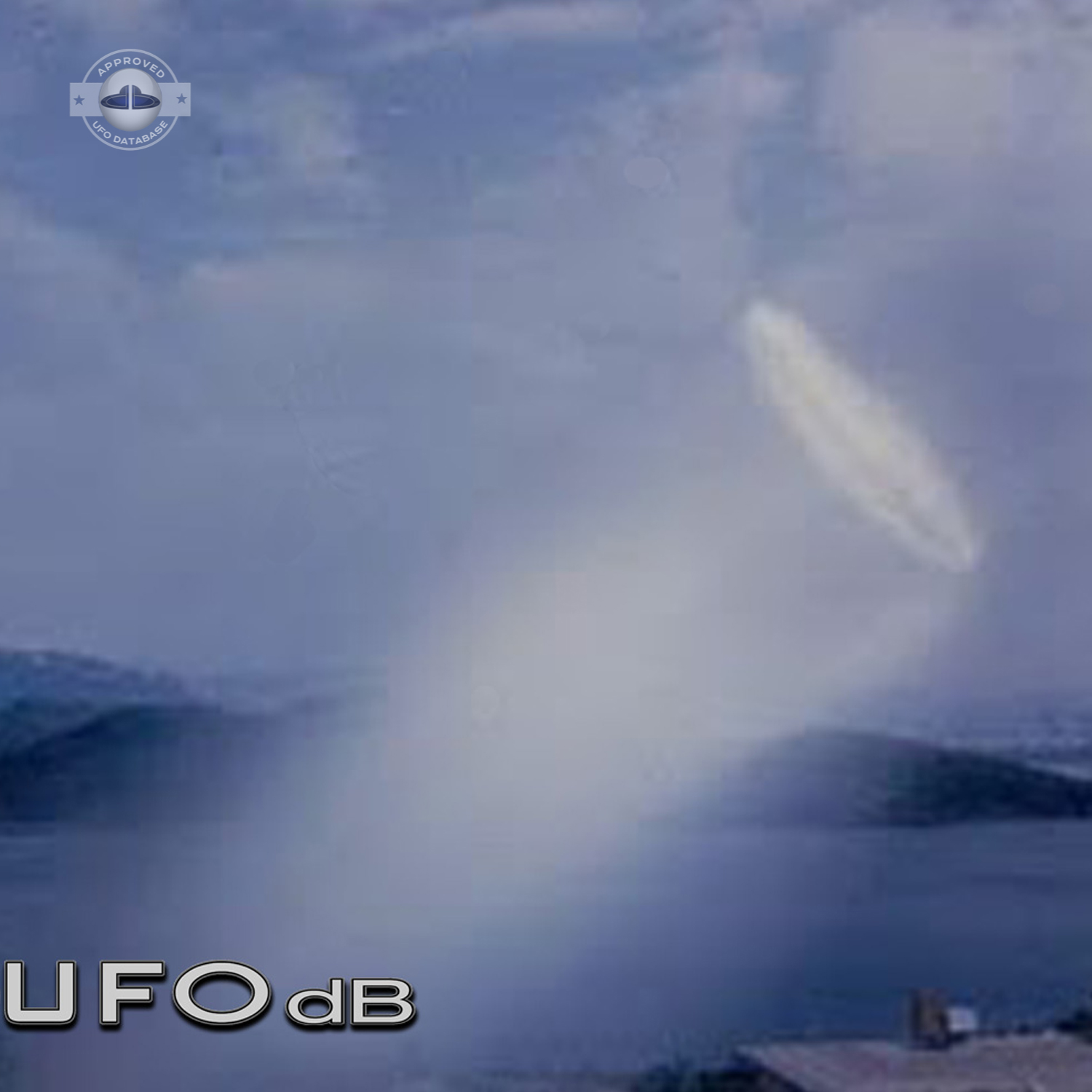 UFO almost sideways over buildings leaving a white gaseous trail 1957 UFO Picture #124-2