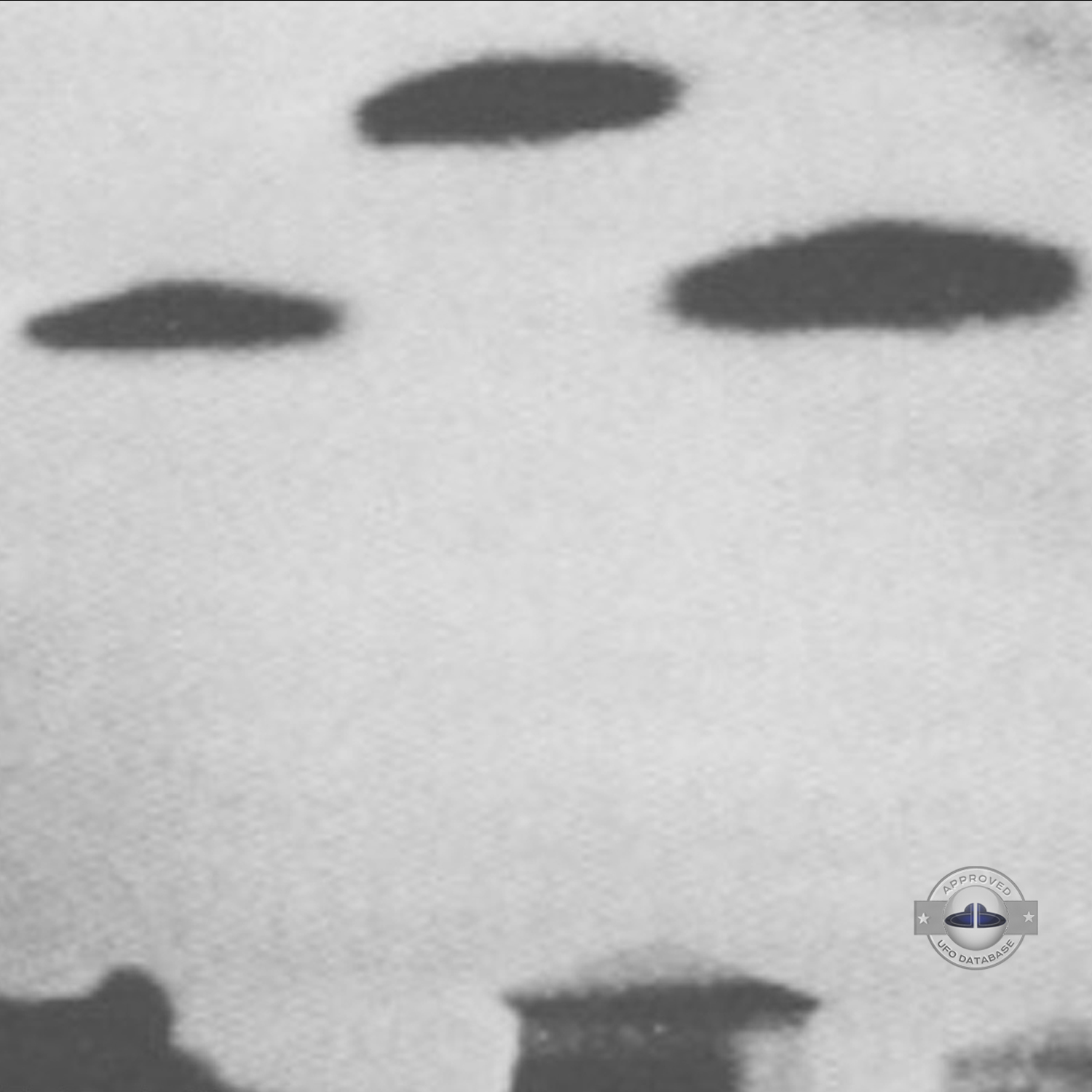 3 dark saucer shape UFOs near church in cathedral square of Sicuani UFO Picture #131-3