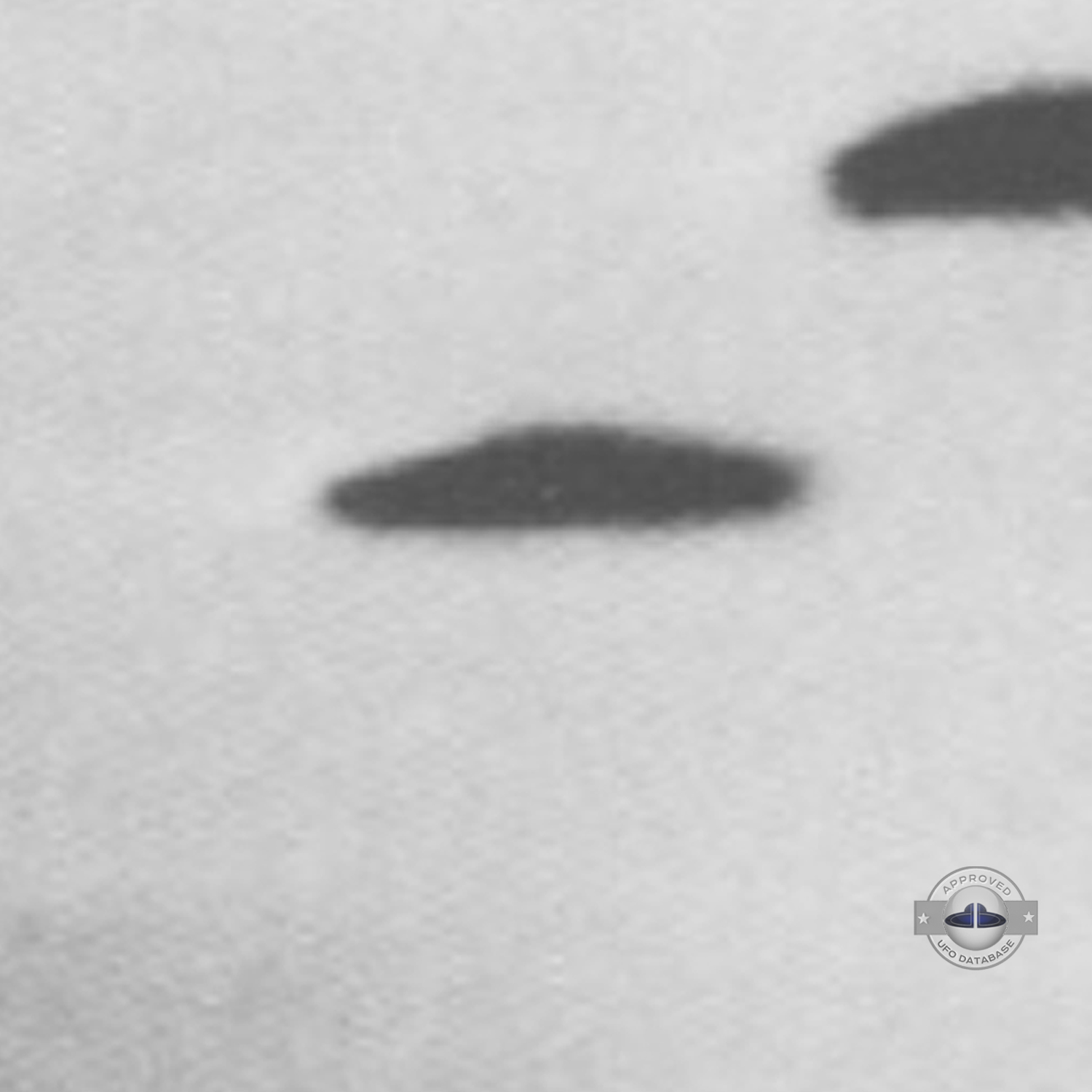 3 dark saucer shape UFOs near church in cathedral square of Sicuani UFO Picture #131-4
