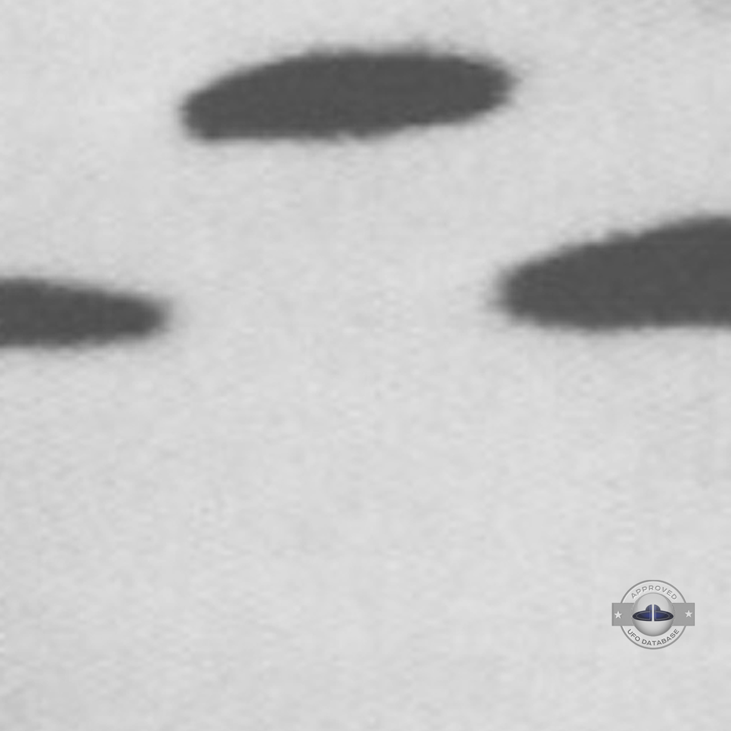 3 dark saucer shape UFOs near church in cathedral square of Sicuani UFO Picture #131-5