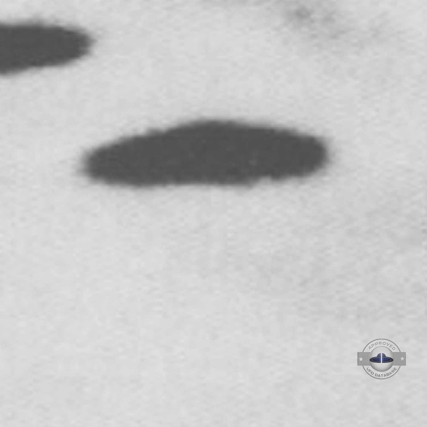 3 dark saucer shape UFOs near church in cathedral square of Sicuani UFO Picture #131-6