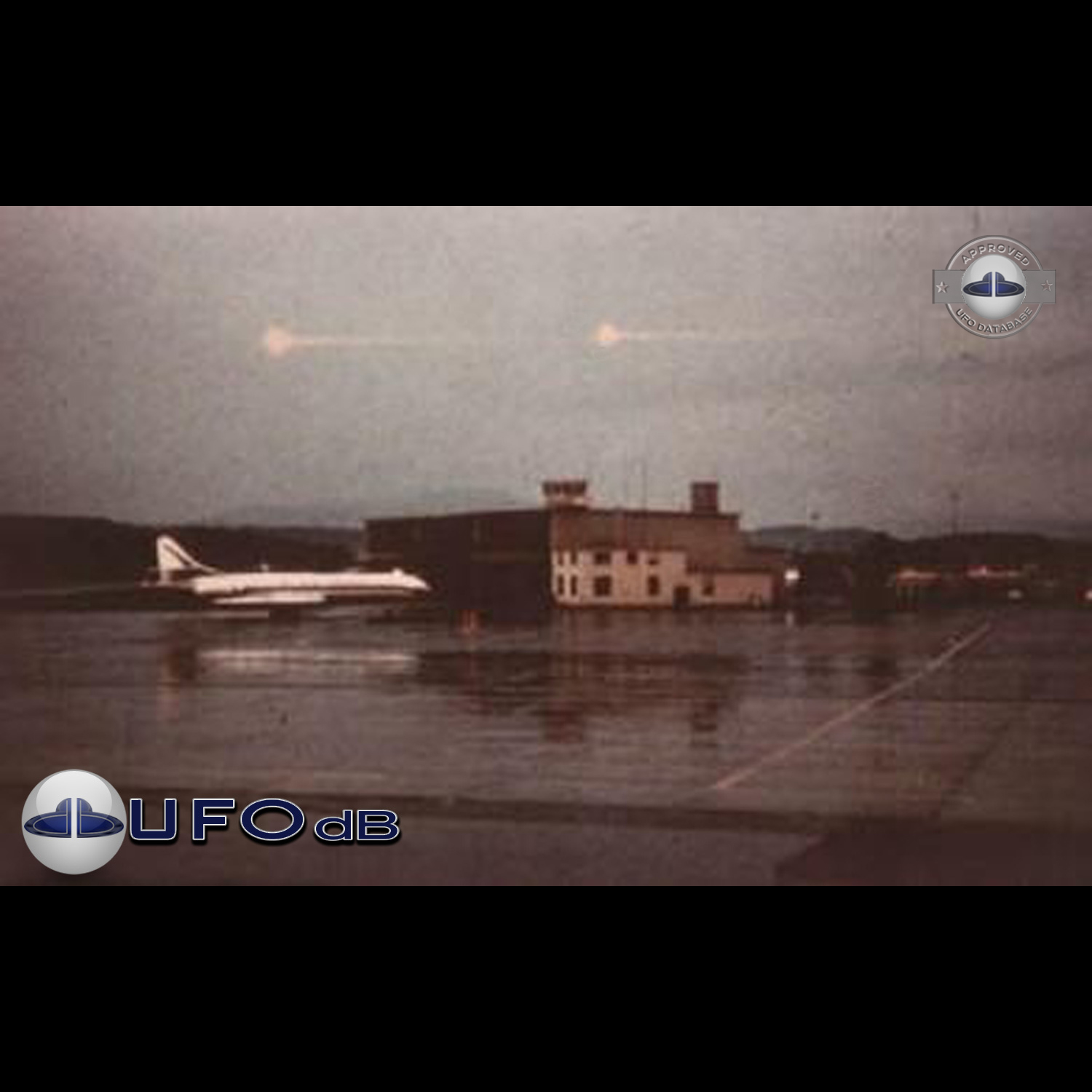 2 light red spheres over control tower of the Zurich-Kloten Airport UFO Picture #140-1