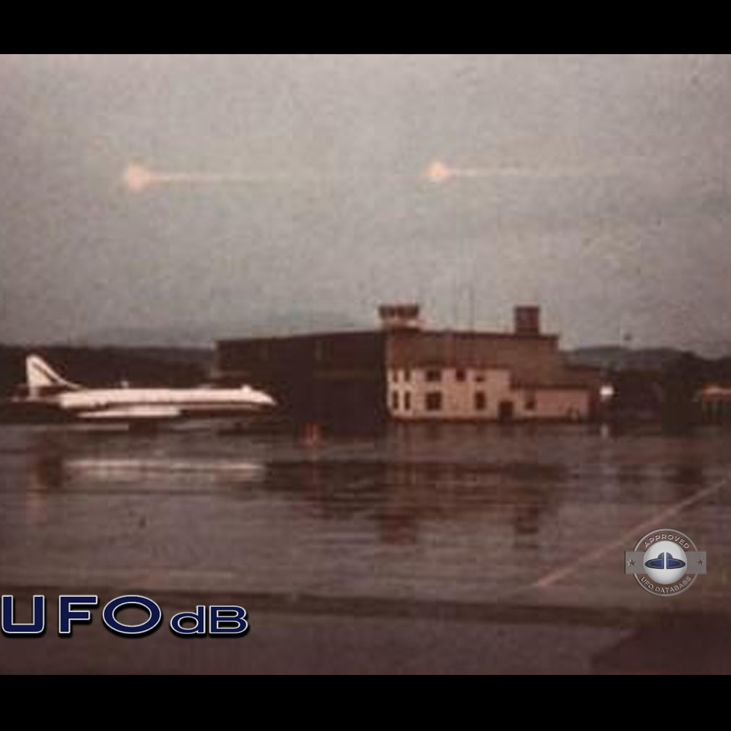 2 light red spheres over control tower of the Zurich-Kloten Airport UFO Picture #140-2