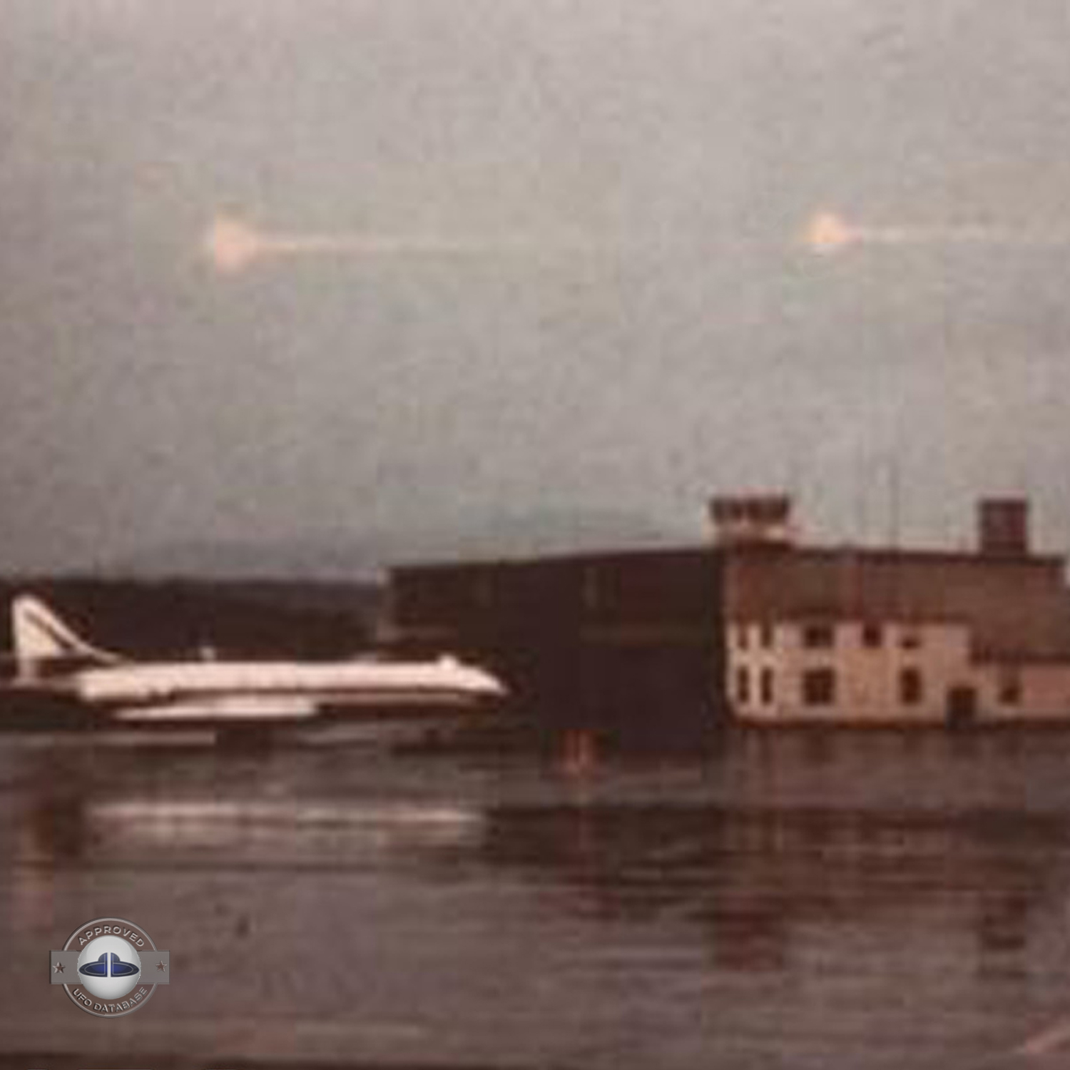2 light red spheres over control tower of the Zurich-Kloten Airport UFO Picture #140-3