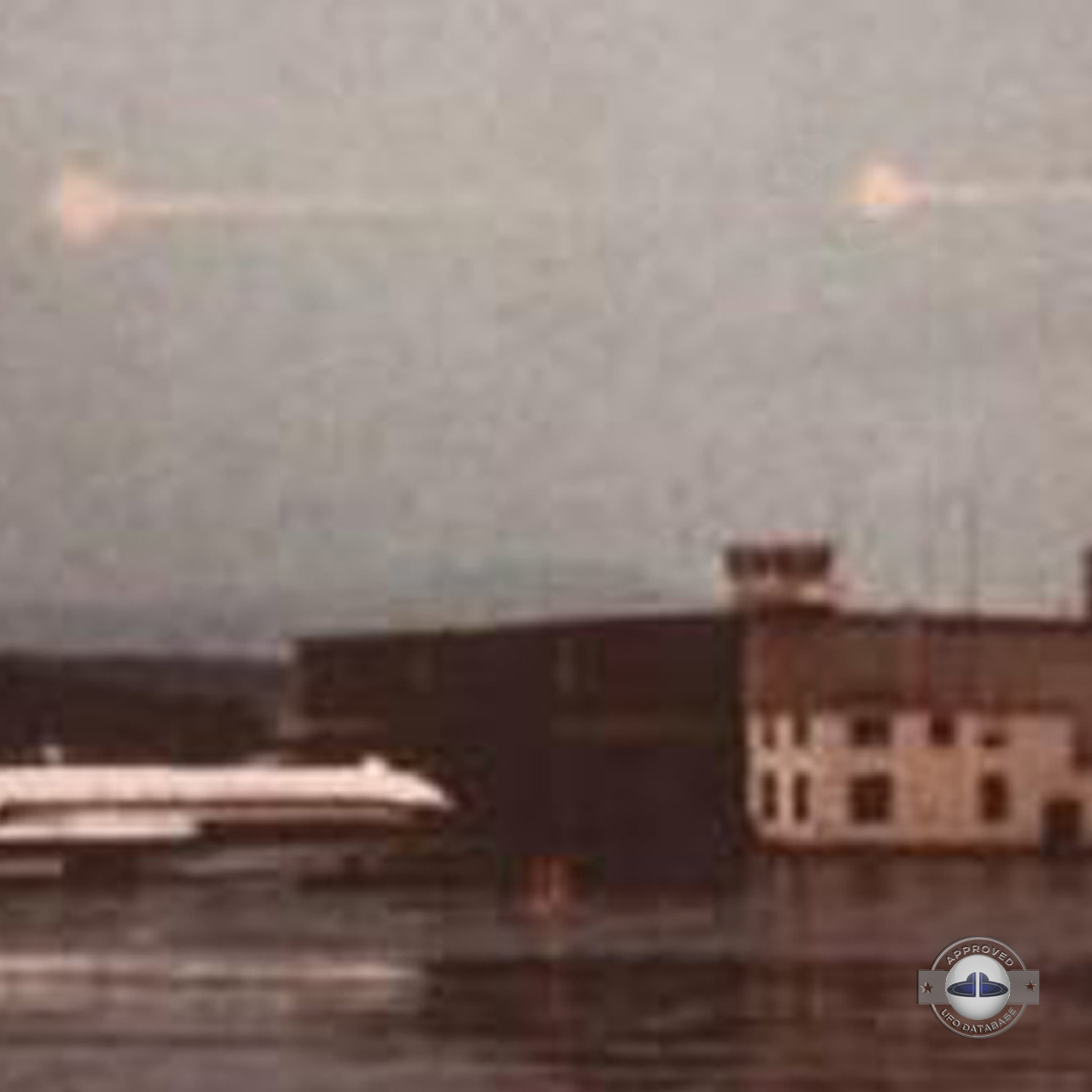 2 light red spheres over control tower of the Zurich-Kloten Airport UFO Picture #140-4