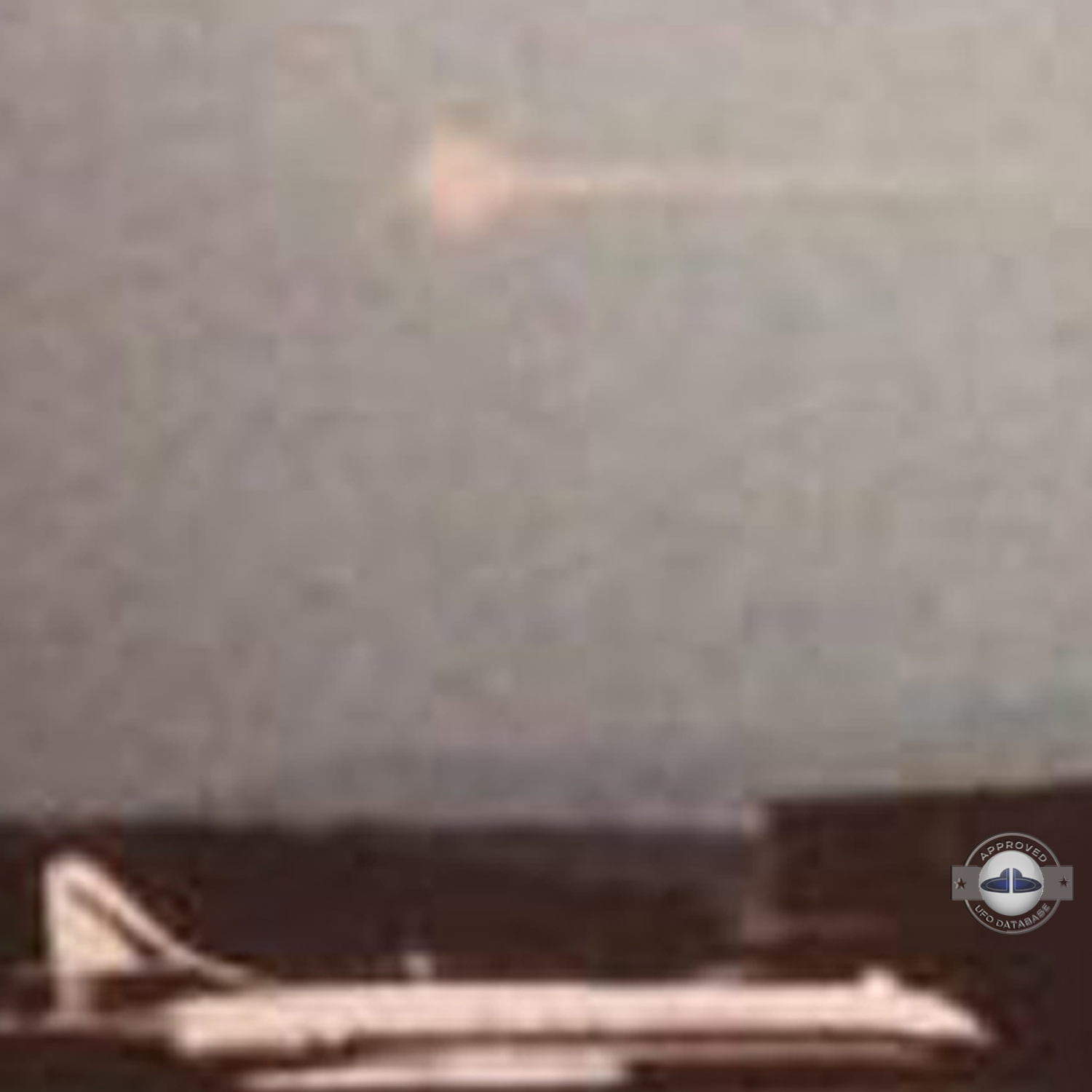 2 light red spheres over control tower of the Zurich-Kloten Airport UFO Picture #140-5