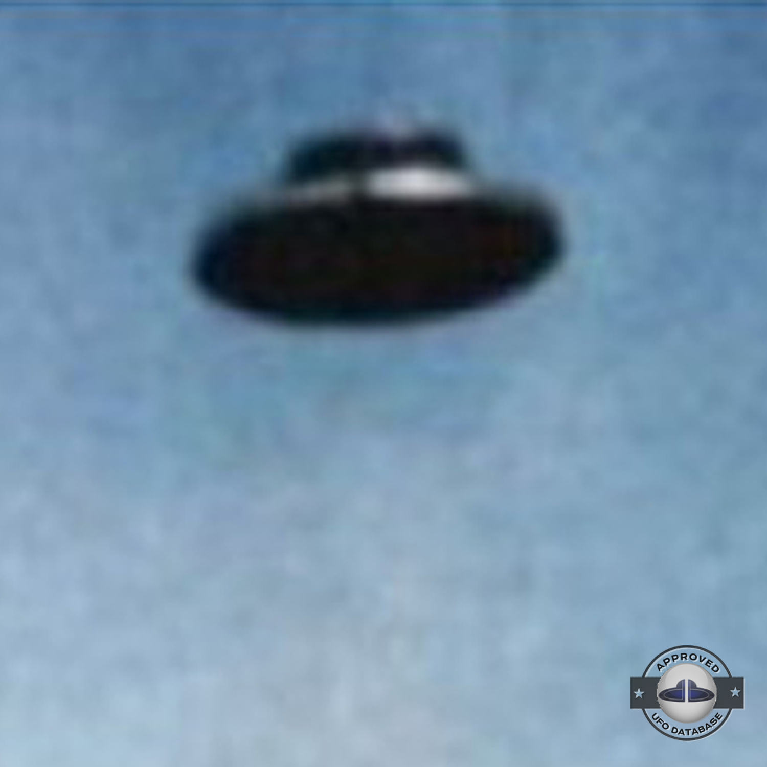 UFO picture - UFO in clear blue sky over one of the pyramid | Mexico UFO Picture #148-4