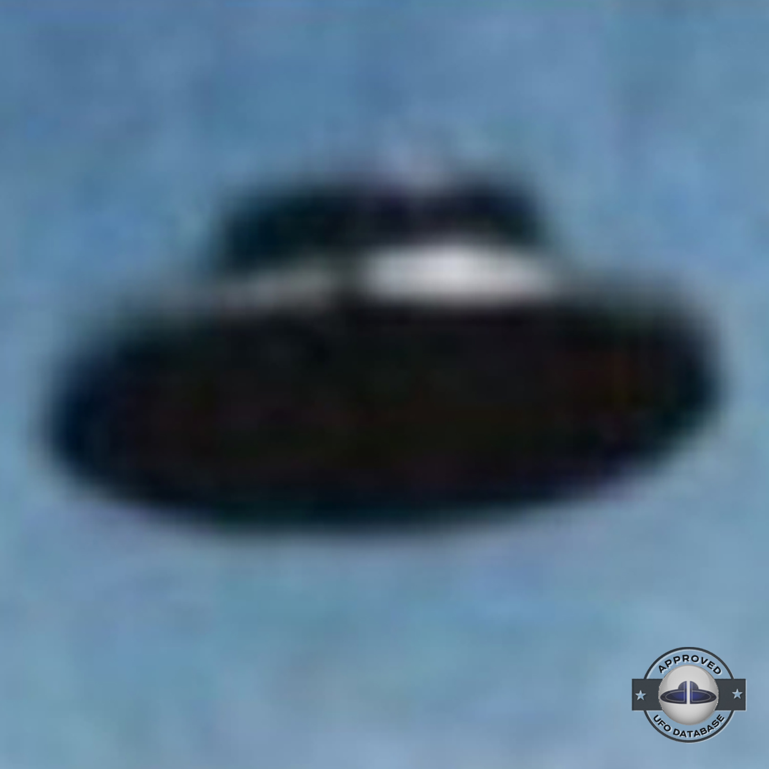 UFO picture - UFO in clear blue sky over one of the pyramid | Mexico UFO Picture #148-5