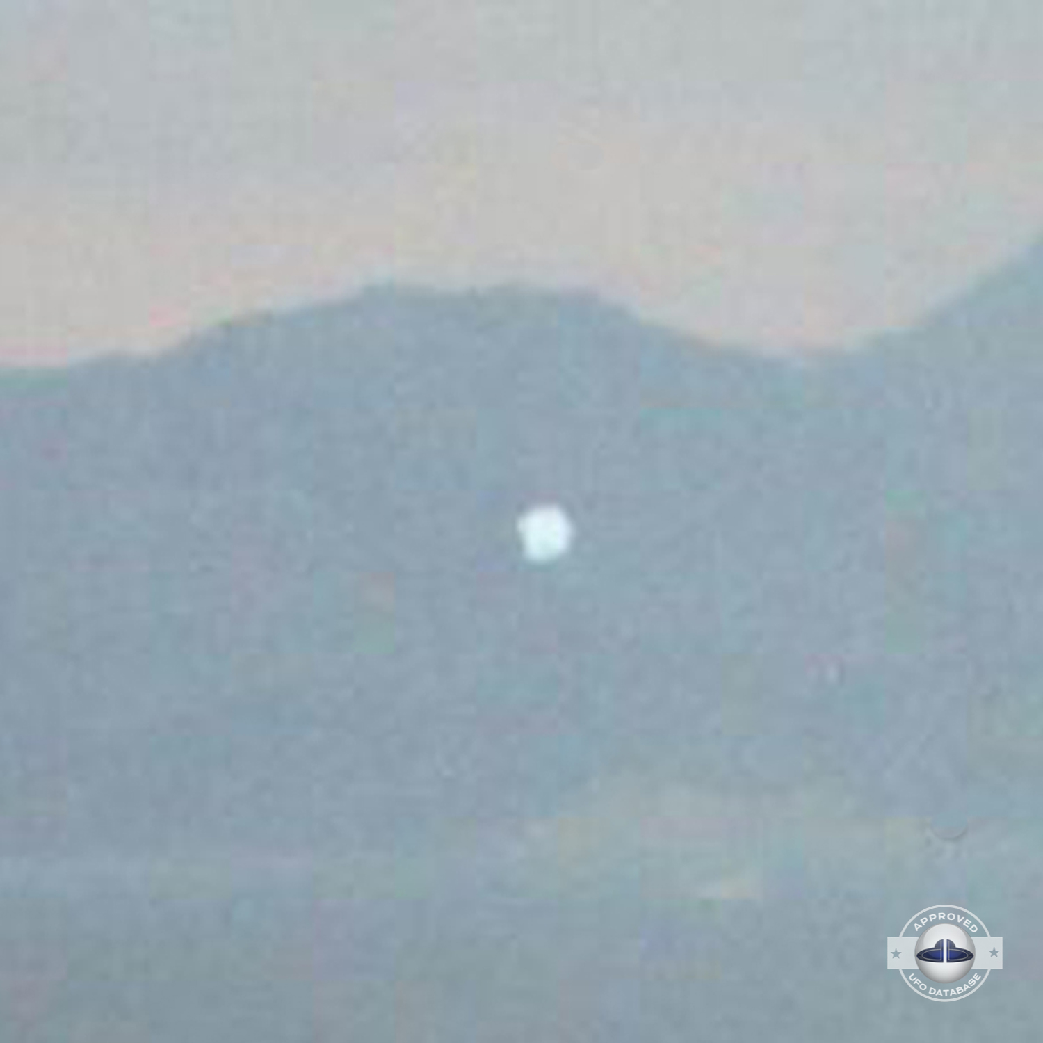 UFO passing over unknown body of water somewhere in Turkey | May 2003 UFO Picture #173-4