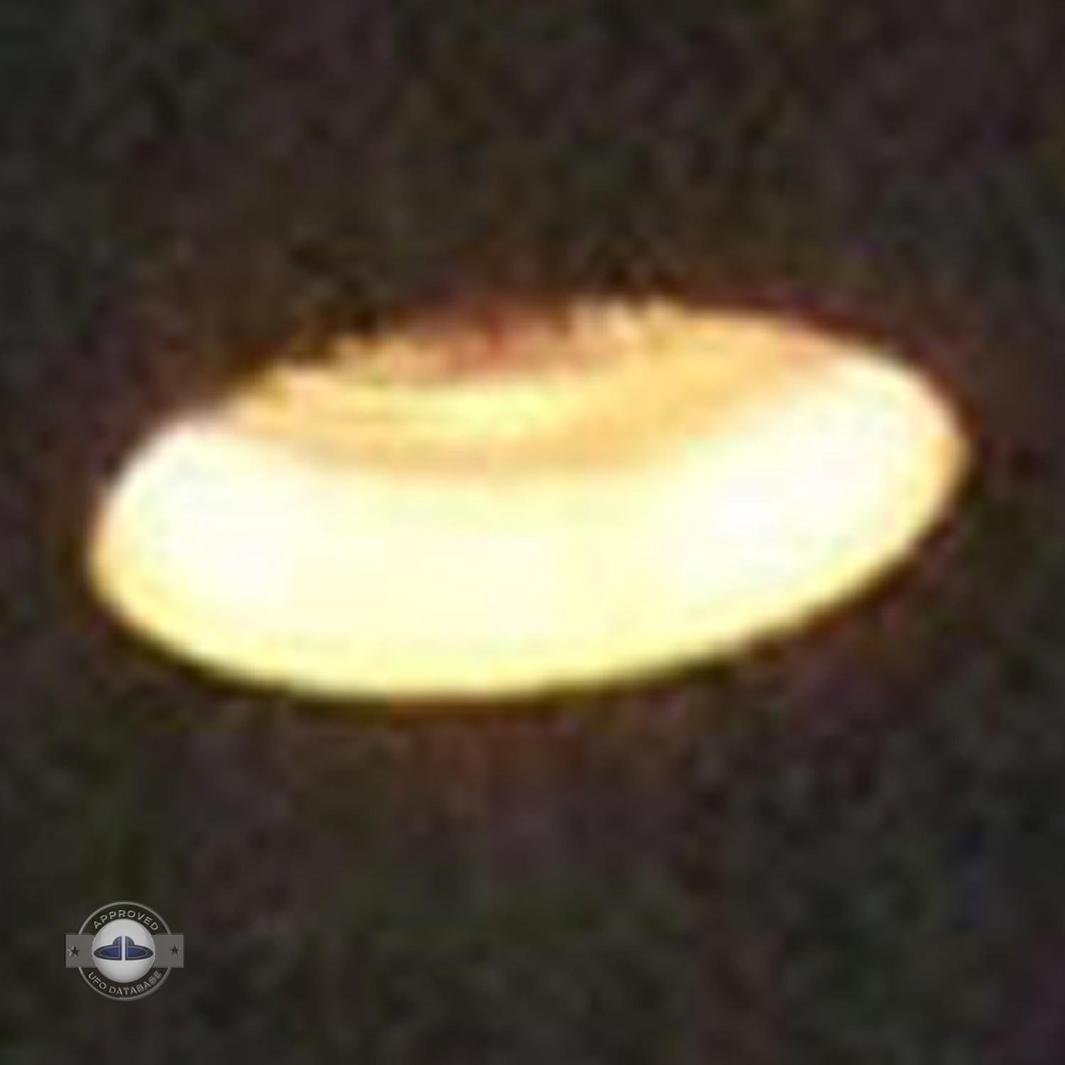 Light Orange glowing UFO saucer over Nagoya, Chubu | Japan 2007 UFO Picture #201-6