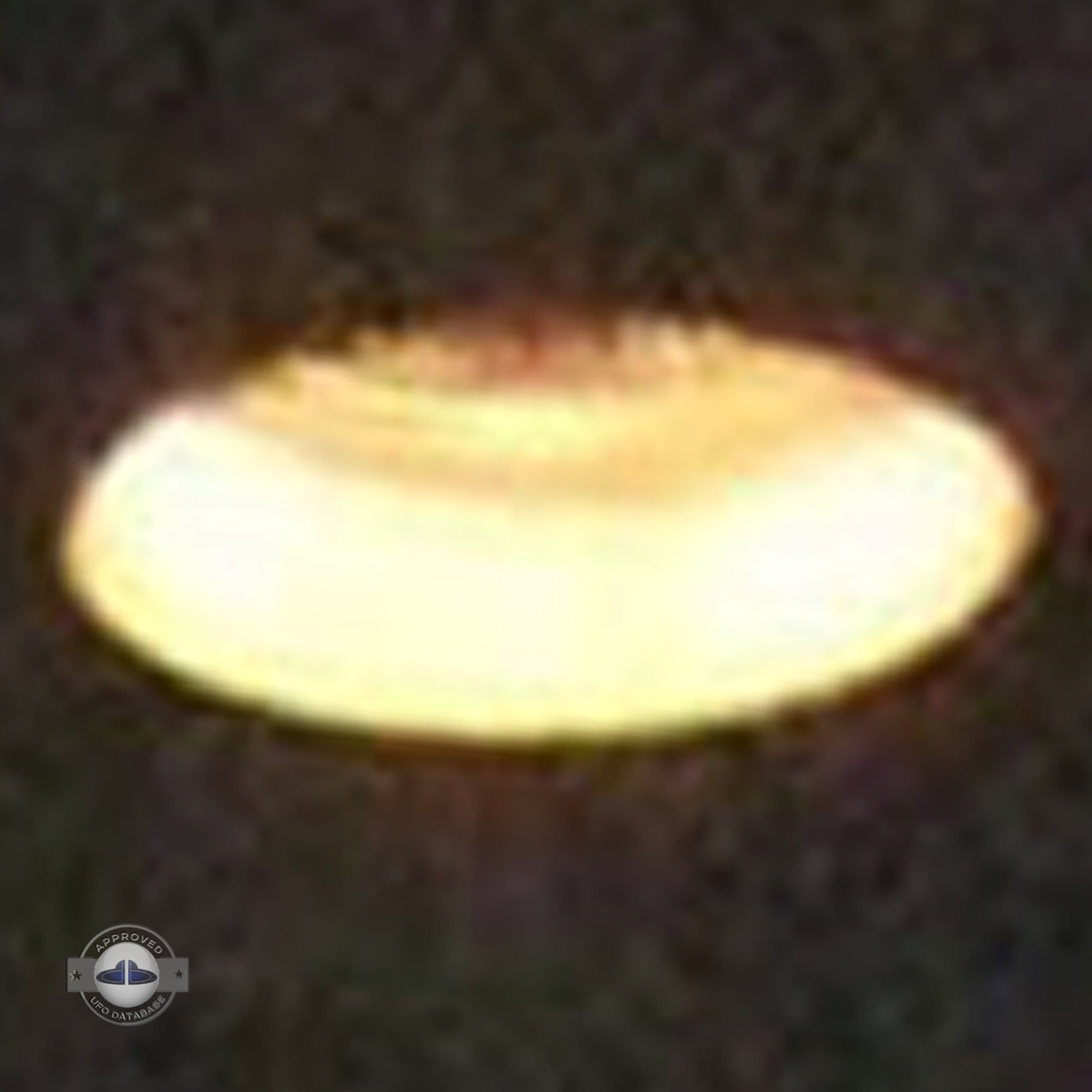 Light Orange glowing UFO saucer over Nagoya, Chubu | Japan 2007 UFO Picture #201-7