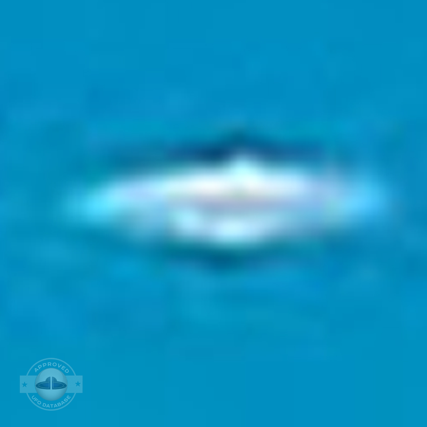 White UFO passing in cloudless turquoise sky over Sao Paulo Brazil UFO Picture #204-5