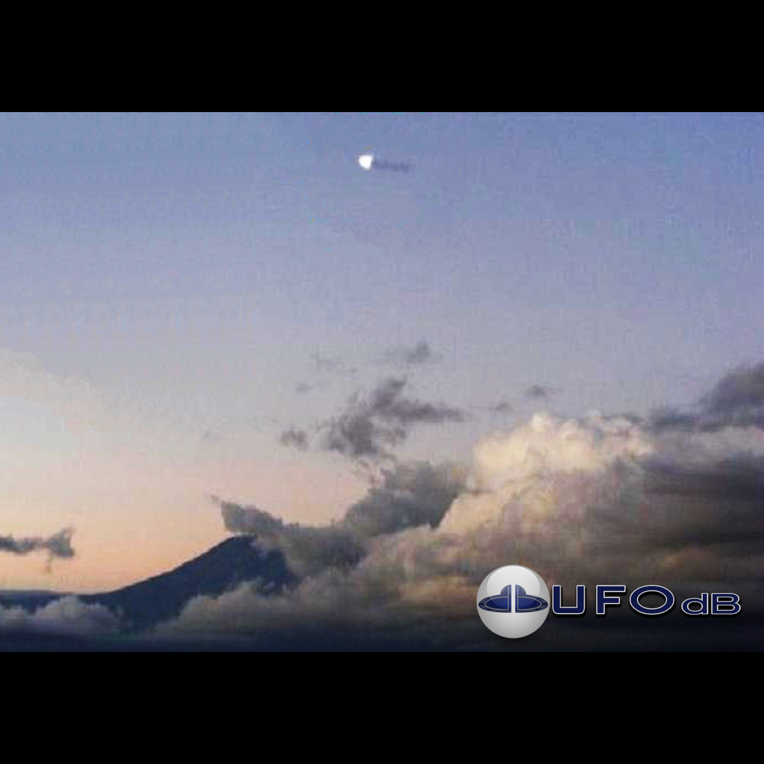 Long Mothership UFO near Africa Mount Kilimanjaro Kenya | June 6 2009 UFO Picture #233-1