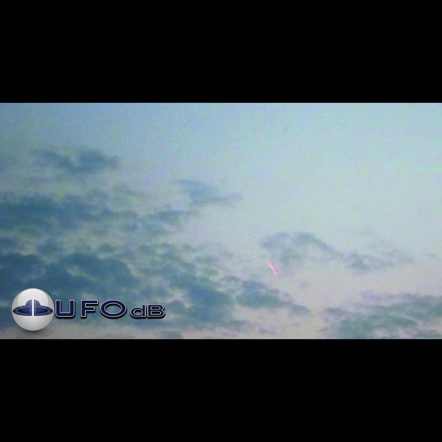 Fire Dragon UFO with glowing tail in clouds over Hefei China | 2011 UFO Picture #234-1
