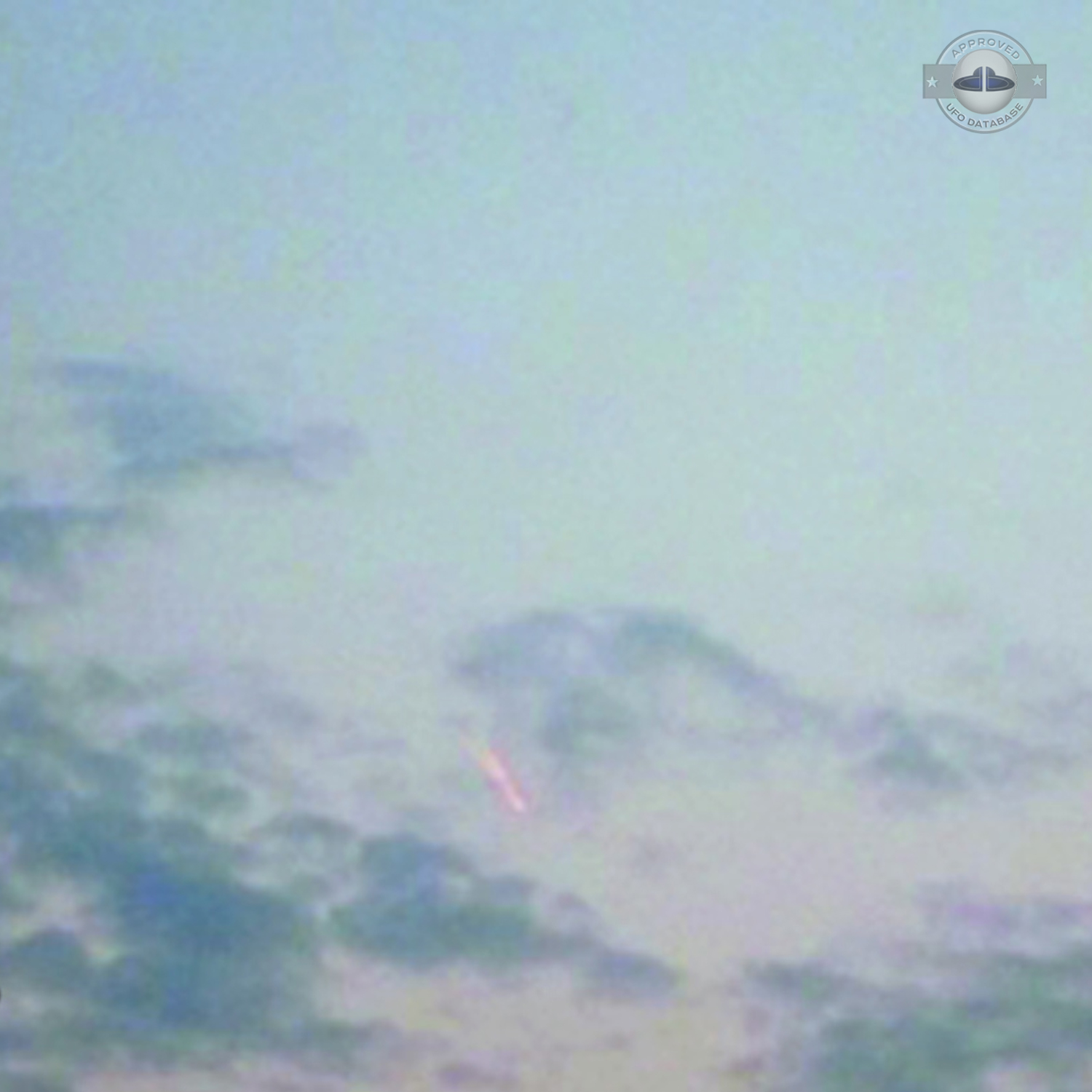 Fire Dragon UFO with glowing tail in clouds over Hefei China | 2011 UFO Picture #234-2