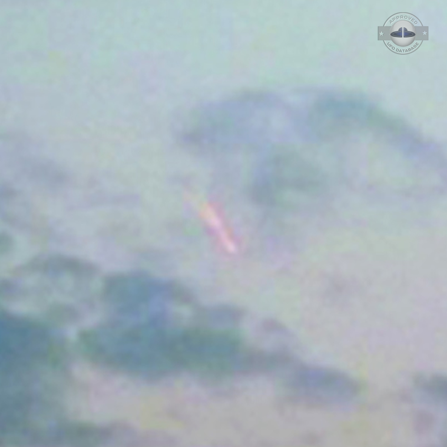 Fire Dragon UFO with glowing tail in clouds over Hefei China | 2011 UFO Picture #234-3