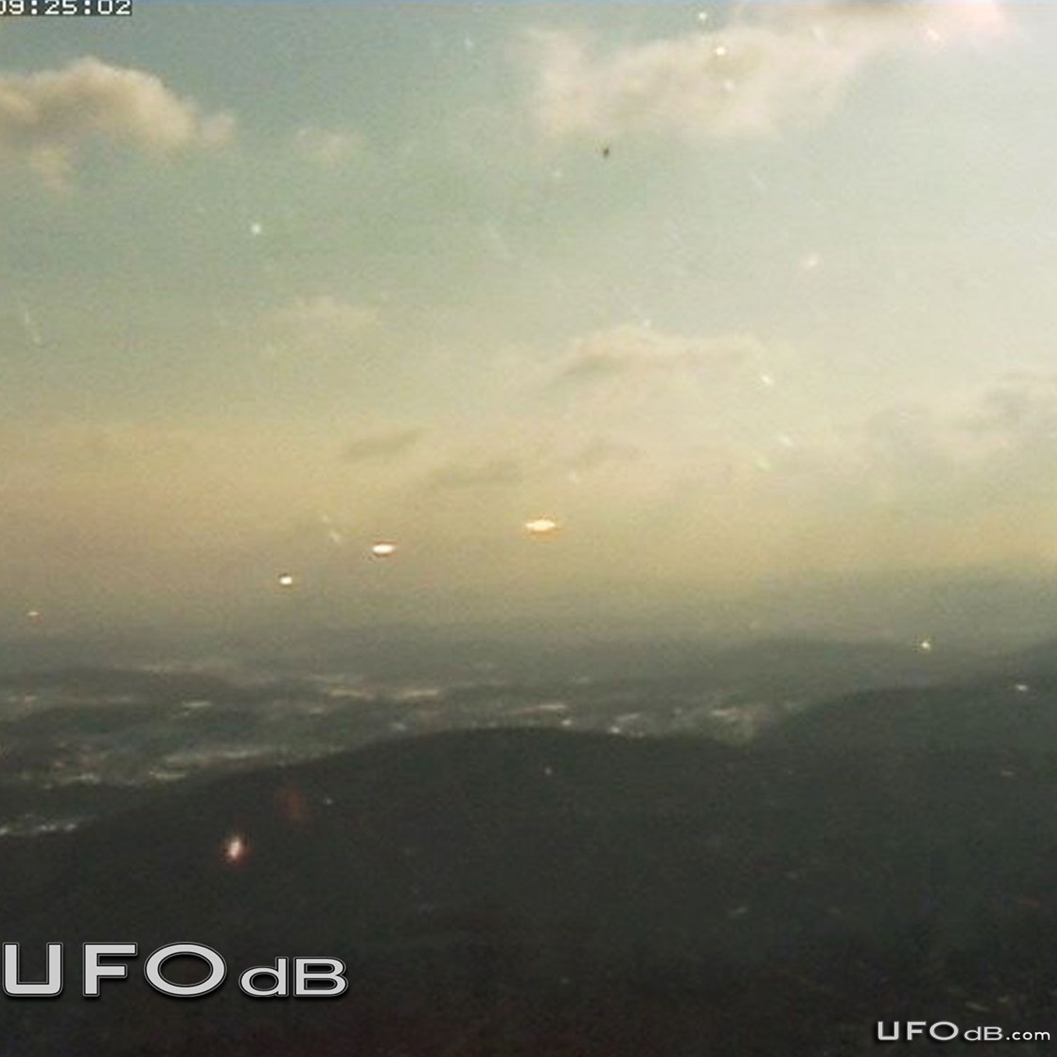 Sunrise reveals a fleet of cloaked UFOs in Chiba, Japan | January 2011 UFO Picture #244-2