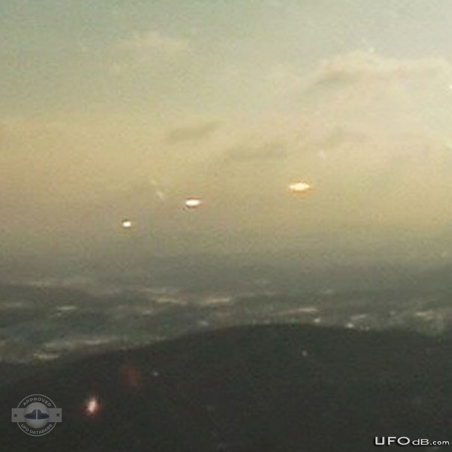 Sunrise reveals a fleet of cloaked UFOs in Chiba, Japan | January 2011 UFO Picture #244-3