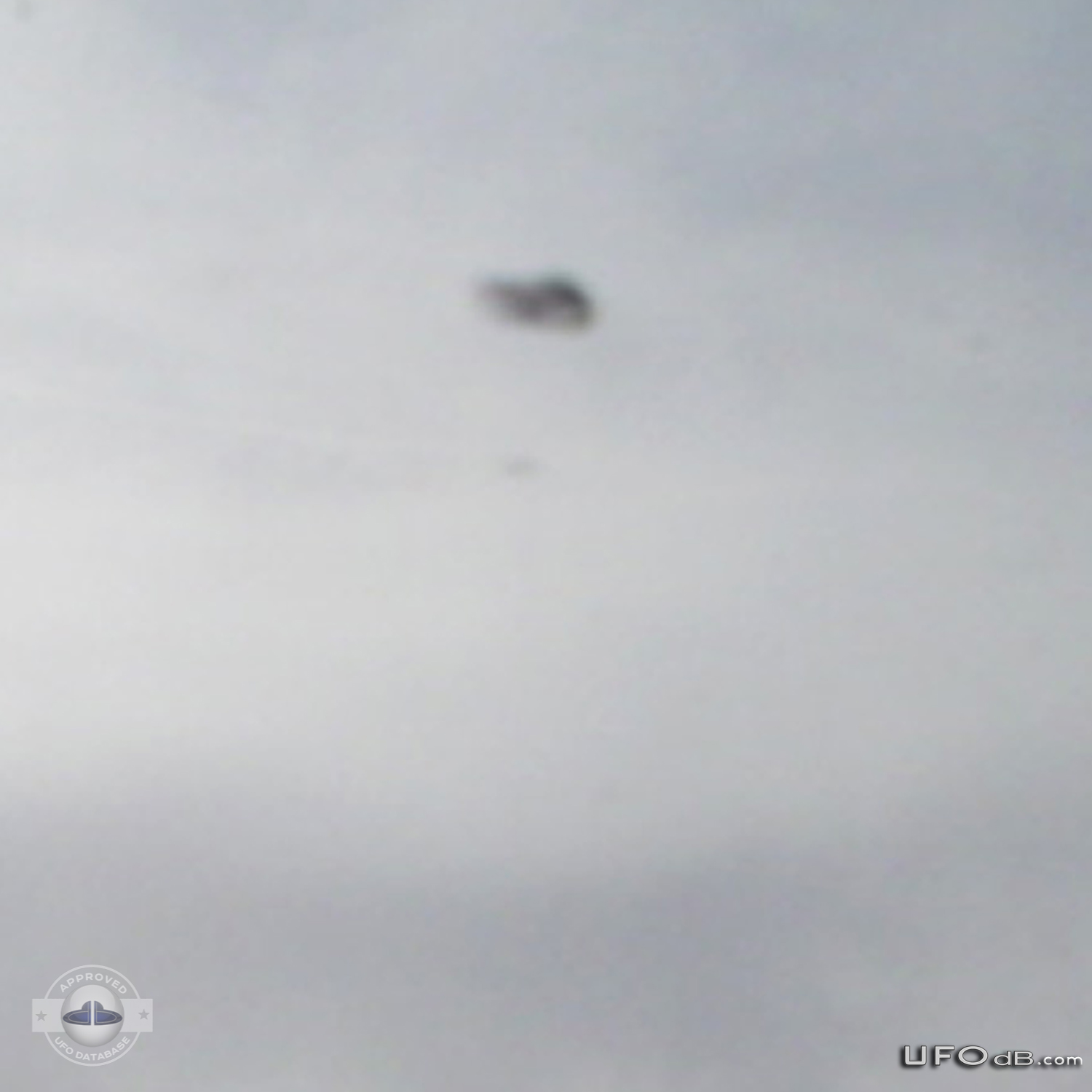 KLM Airplane passenger see UFO near wing | Amsterdam, Netherlands 2006 UFO Picture #255-4