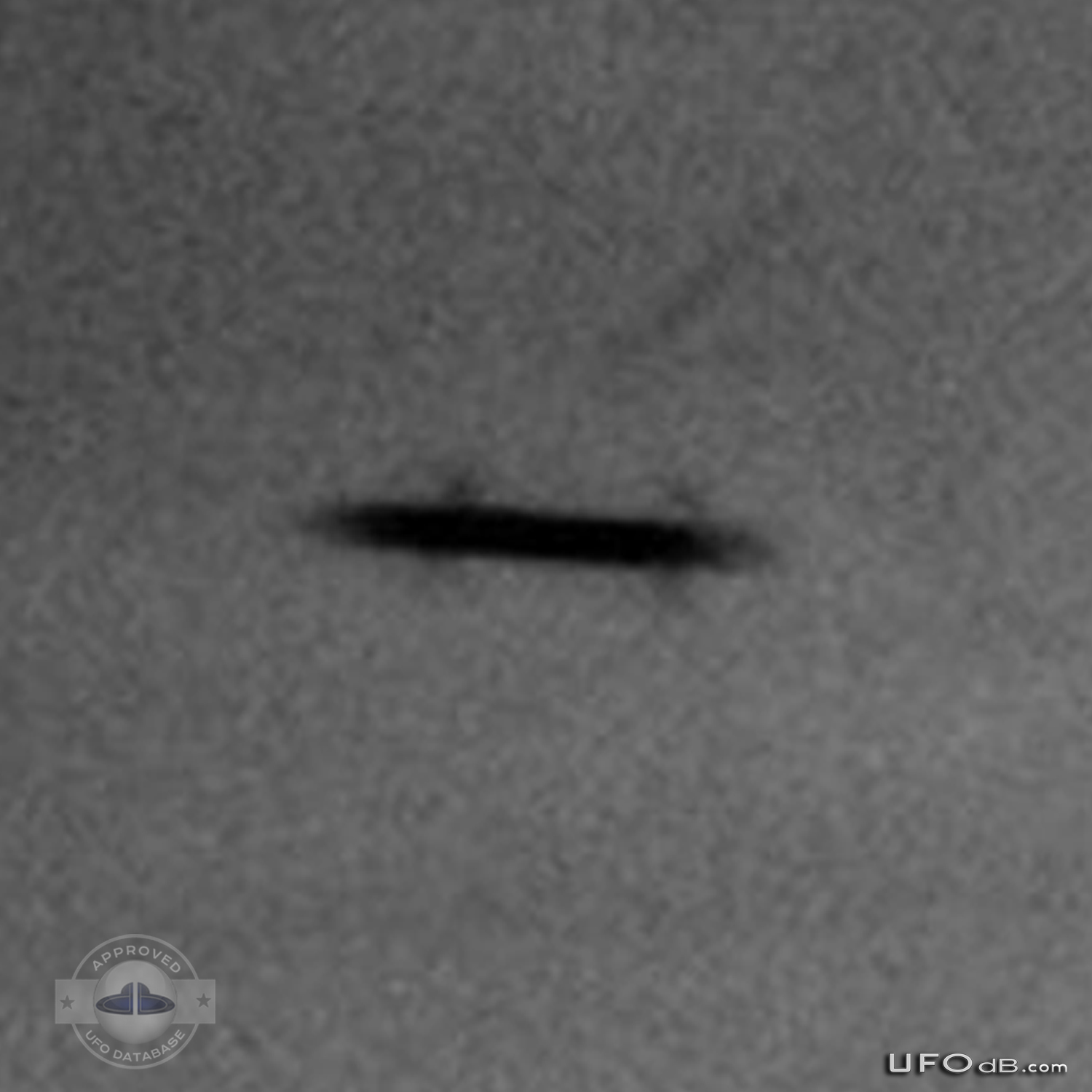 Dark Winged Saucer UFO over the town of Havant, England | April 7 2011 UFO Picture #263-4