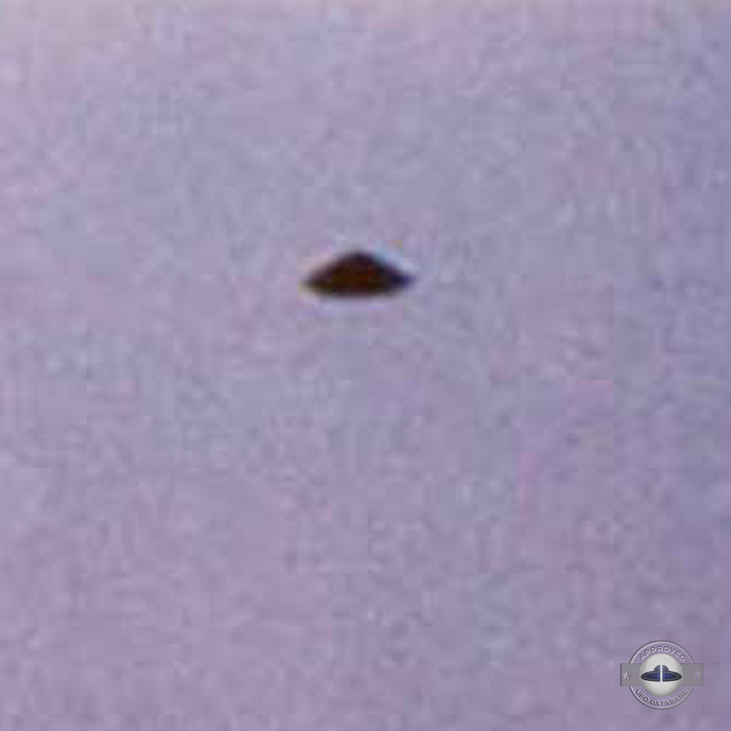 UFO seen over a roof of a house in Puerto Madryn in Argentina 1975 UFO Picture #28-3