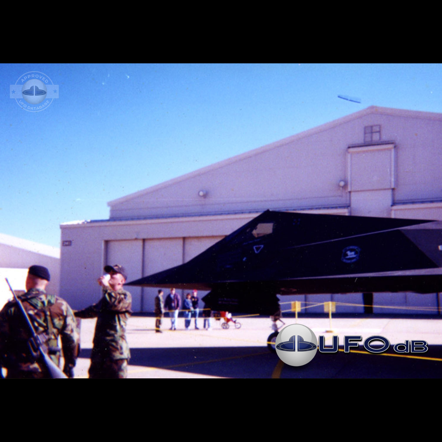 Little Rock, Arkansas UFO Pictures | UFO over hangar during Air Show UFO Picture #3-1