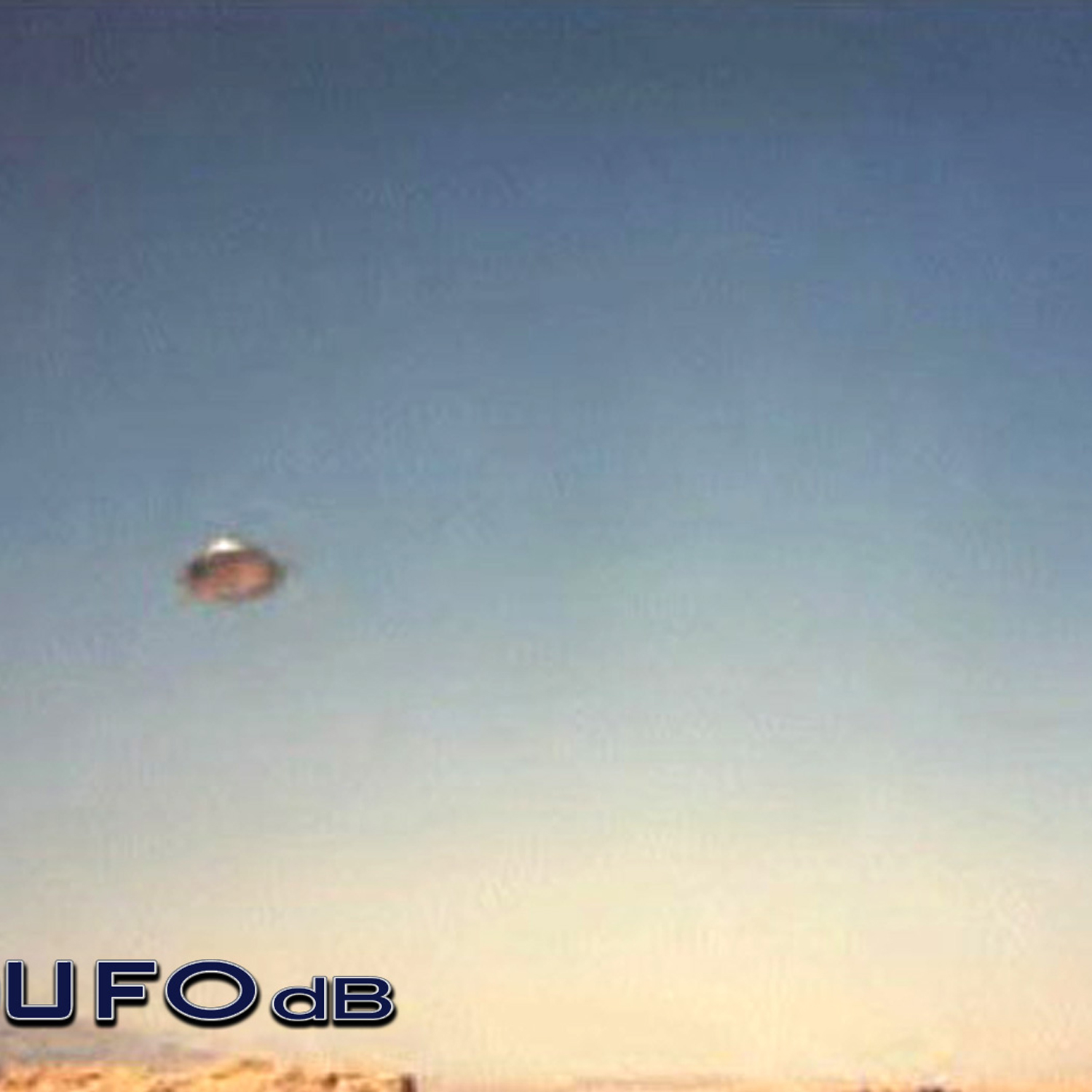 UFO Picture caught in bright day light over desertic mountains UFO Picture #30-2