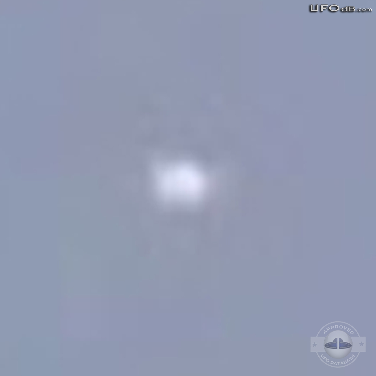 White craft UFO passing in the clouds of Mexico City | May 13 2011 UFO Picture #305-5