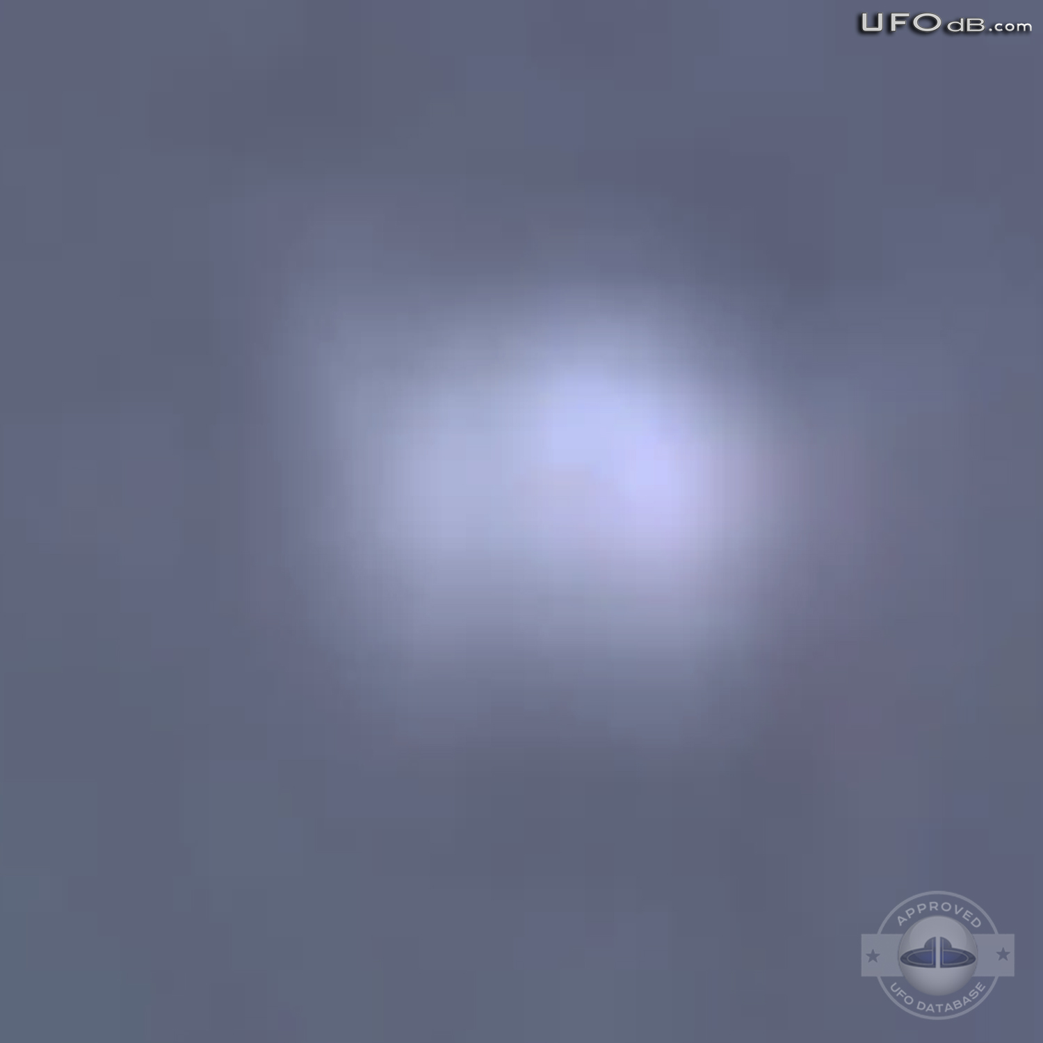 White craft UFO passing in the clouds of Mexico City | May 13 2011 UFO Picture #305-6