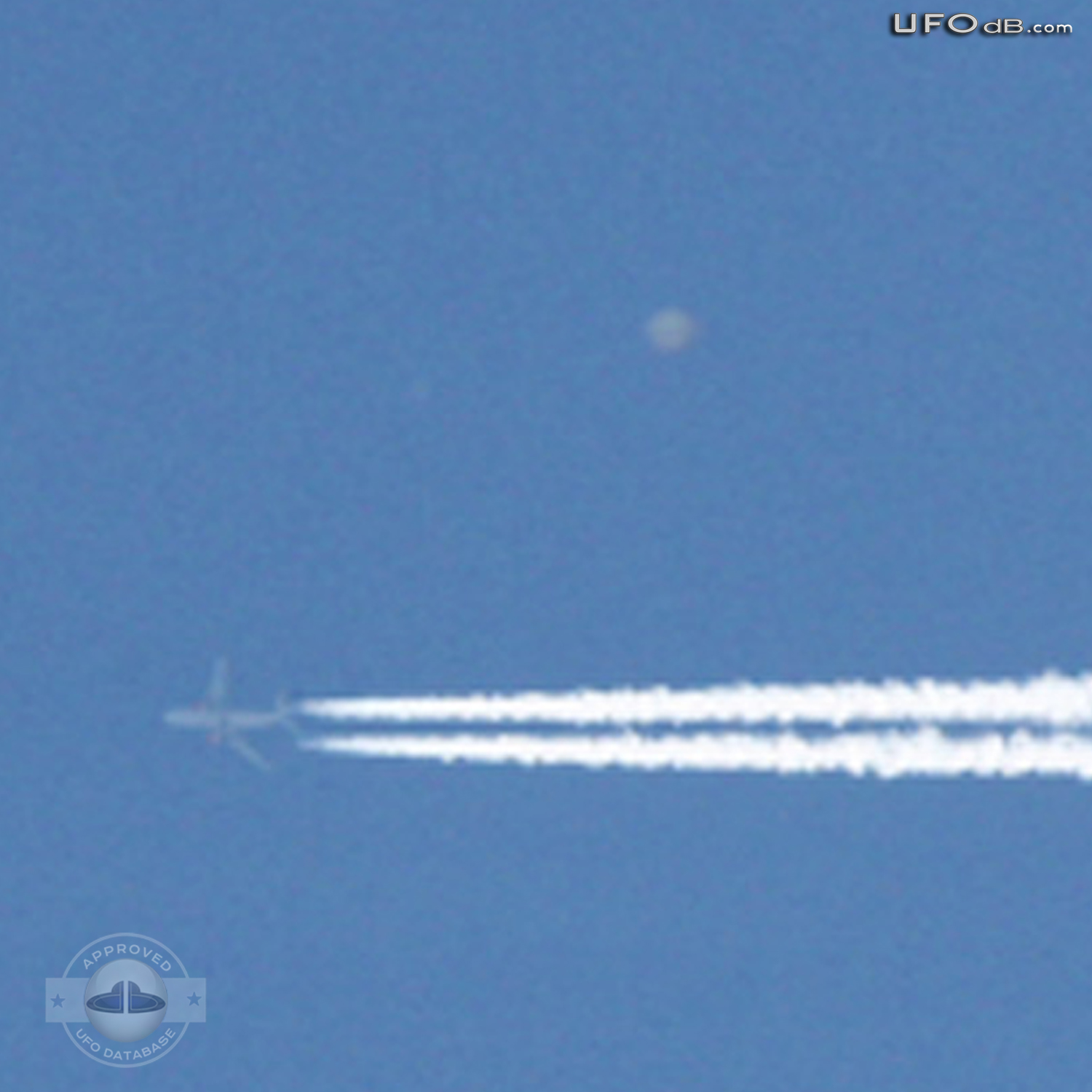 High Altitude UFO near airplane caught on picture Norwich UK May 2011 UFO Picture #309-3