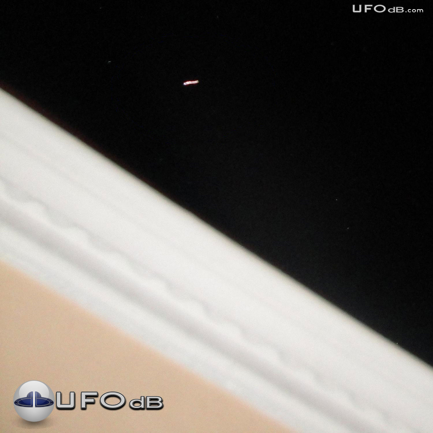 Bouncing UFO seen during Eclipse in Dominican Republic | December 2010 UFO Picture #313-1
