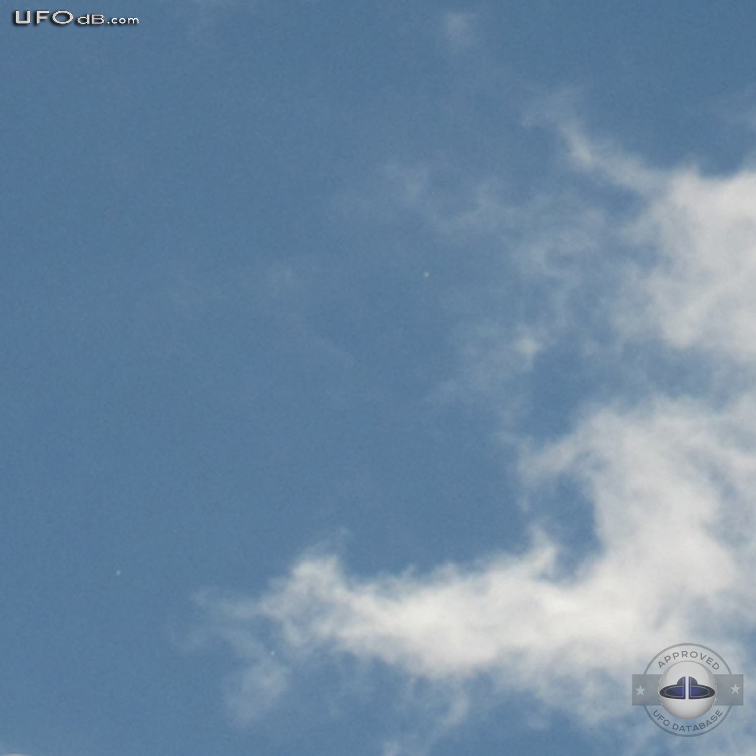 White disc UFOs hides behind clouds Davao Philippines November 3 2010 UFO Picture #340-3
