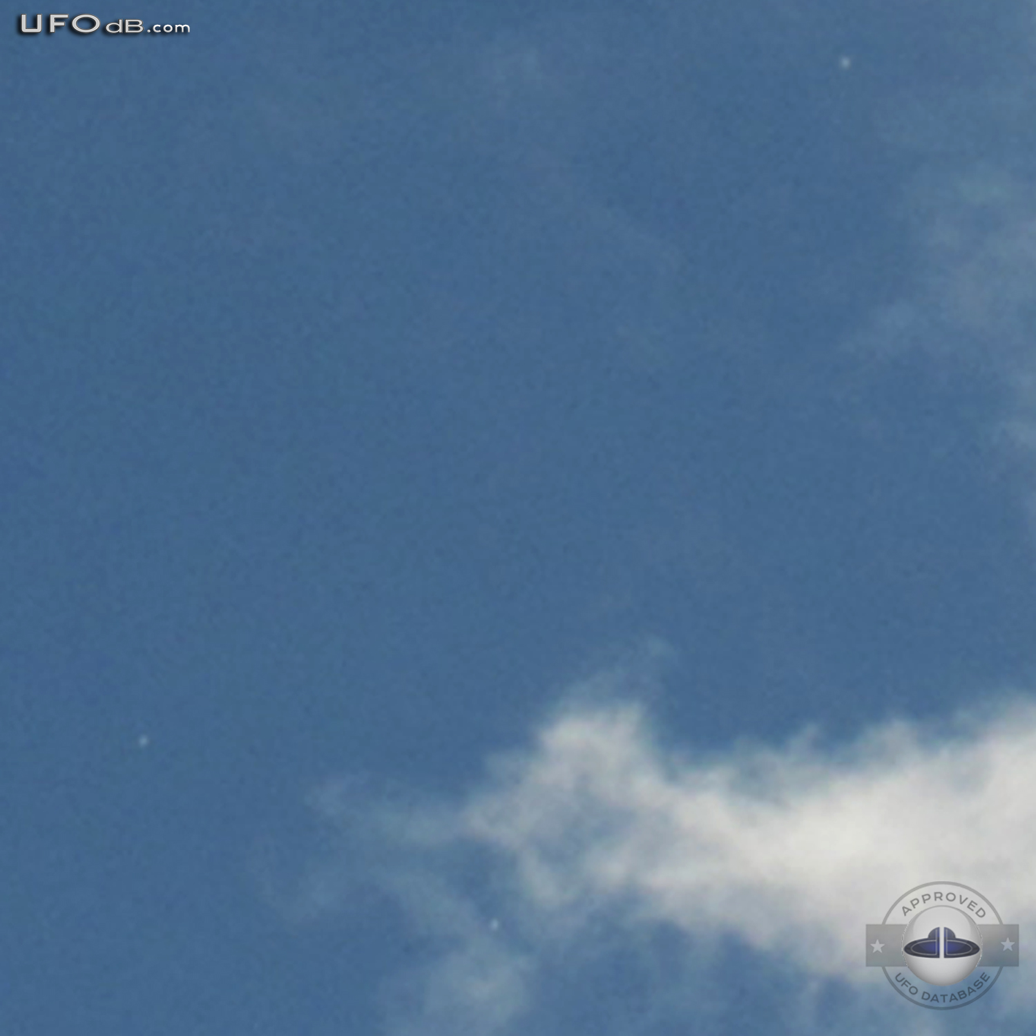 White disc UFOs hides behind clouds Davao Philippines November 3 2010 UFO Picture #340-4
