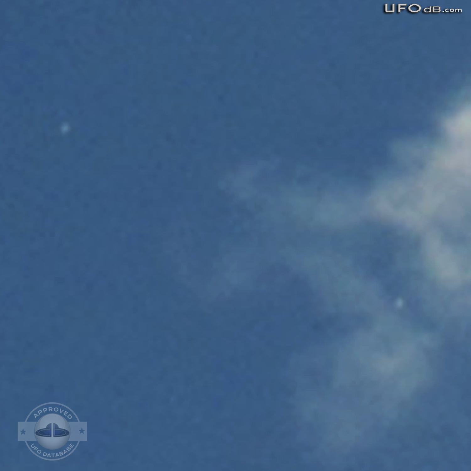 White disc UFOs hides behind clouds Davao Philippines November 3 2010 UFO Picture #340-5