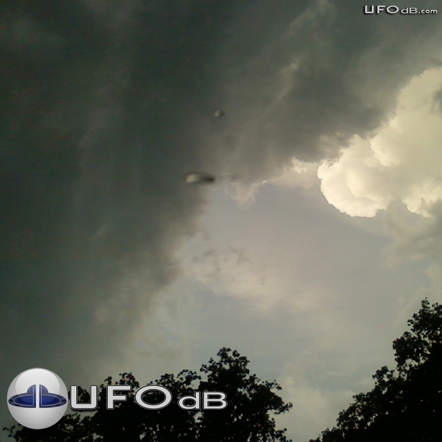 Fort Worth Texas Storm Picture reveals UFOs near clouds | May 24 2011 UFO Picture #343-2