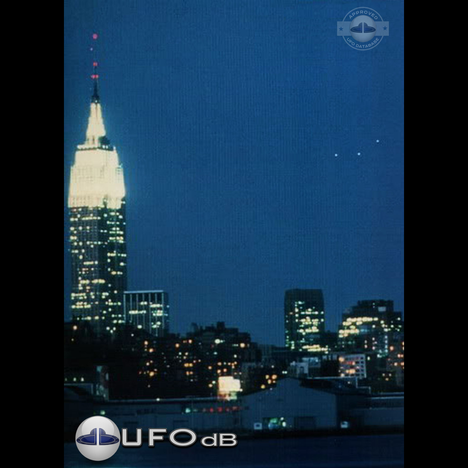 UFO picture showing 3 bright white UFO over Empire State Building UFO Picture #35-1