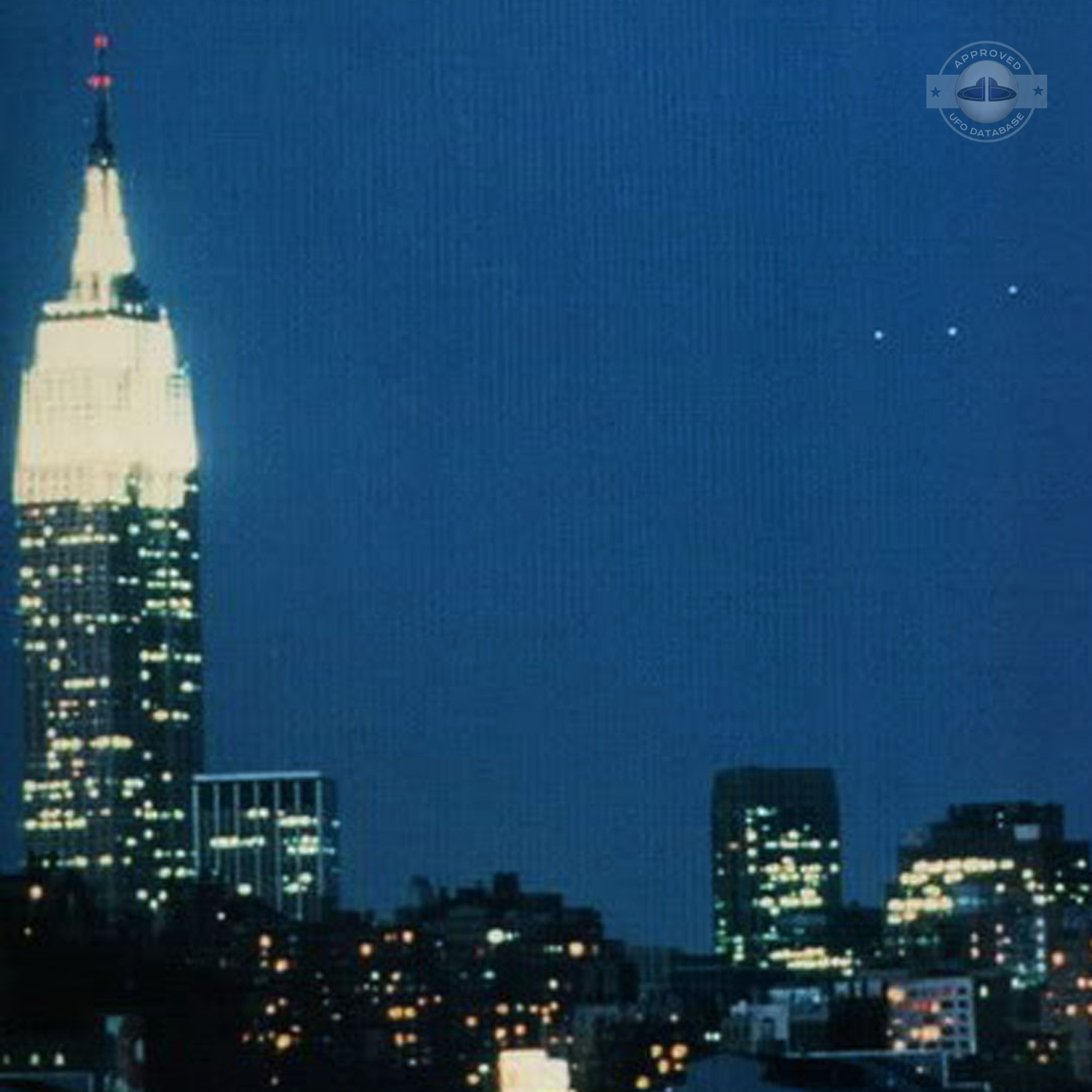 UFO picture showing 3 bright white UFO over Empire State Building UFO Picture #35-2