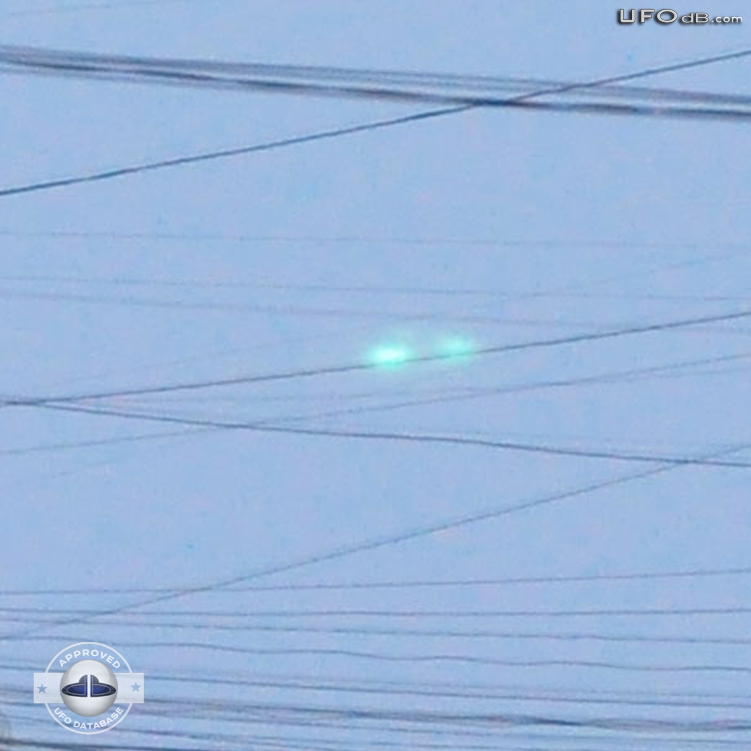 Turquoise flashing lights UFO caught passing over Yakutsk Russia 2011 UFO Picture #350-3