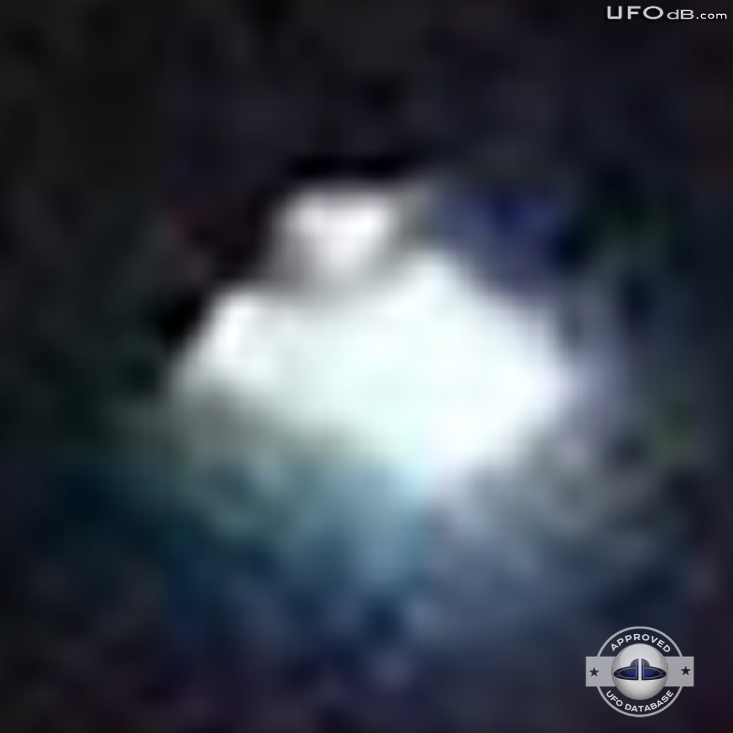 Moon picture captures bright white glowing UFO over a city in Ecuador UFO Picture #352-5