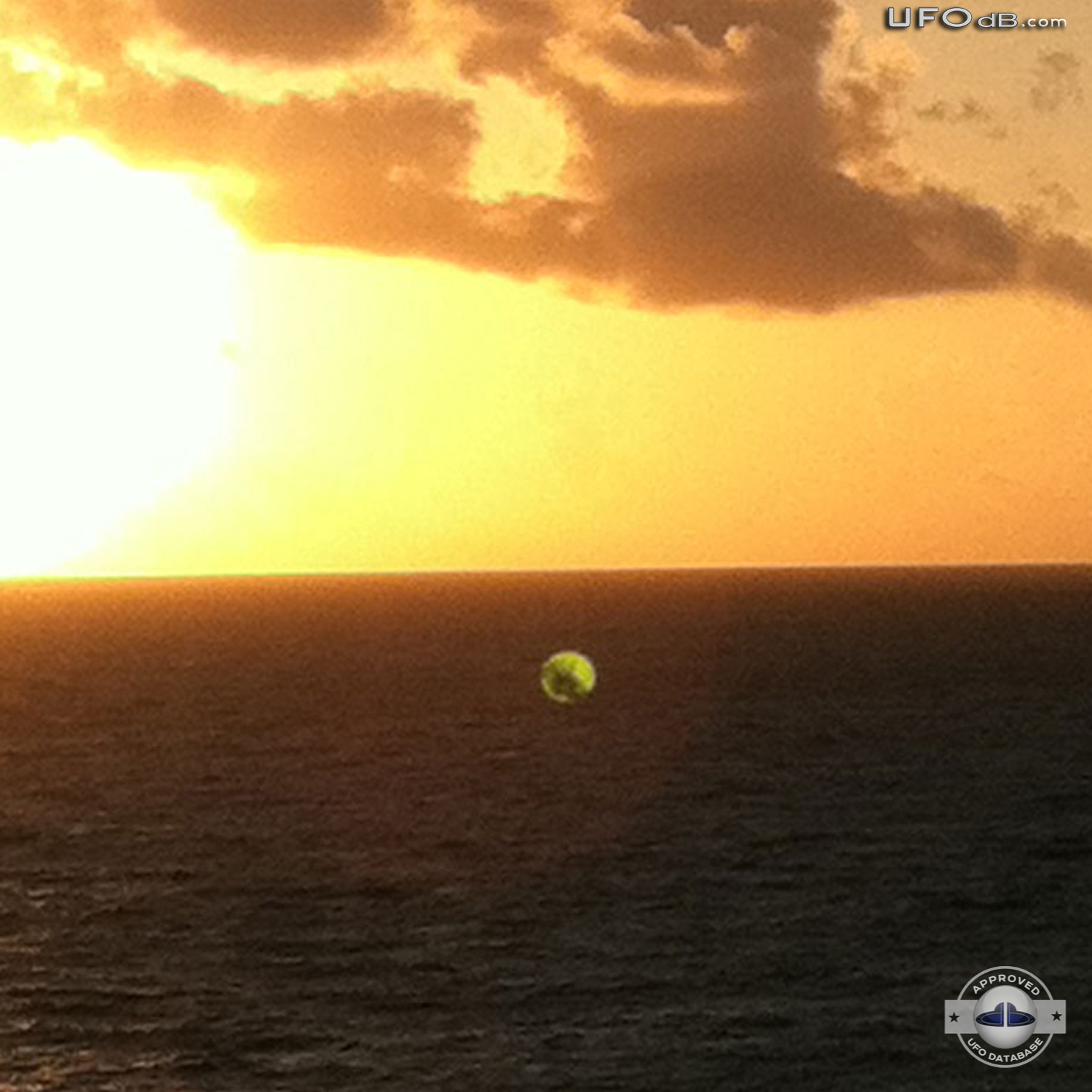 Green Sphere UFO caught on picture over the ocean | Miami Beach | 2011 UFO Picture #356-2