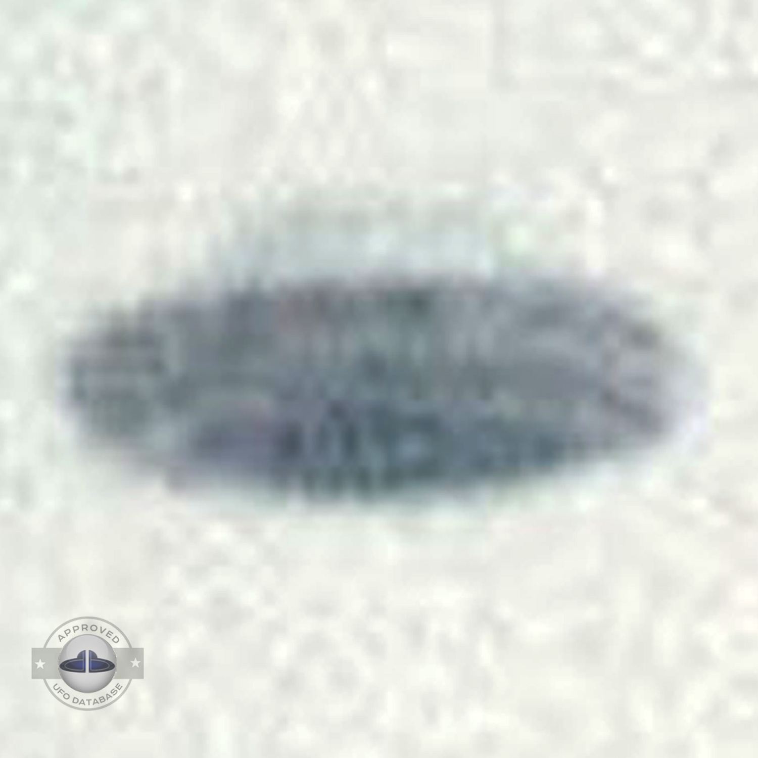 UFO picture showing UFO over snowy mountains during the day UFO Picture #36-5