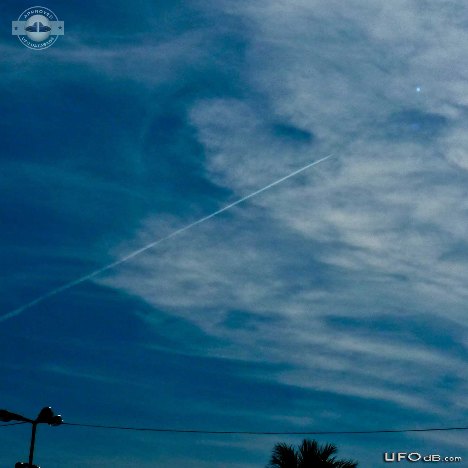 Sphere UFO caught on picture near chemtrail in Albania - October 2011 UFO Picture #374-1