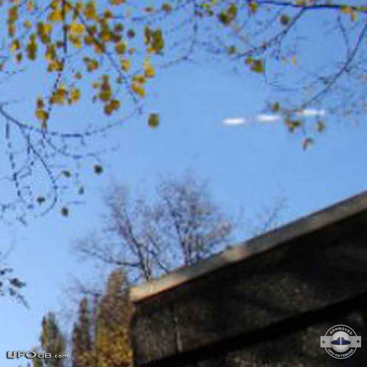 Fleet of 3 UFOs in formation caught on picture over Amsterdam in 2011 UFO Picture #378-4
