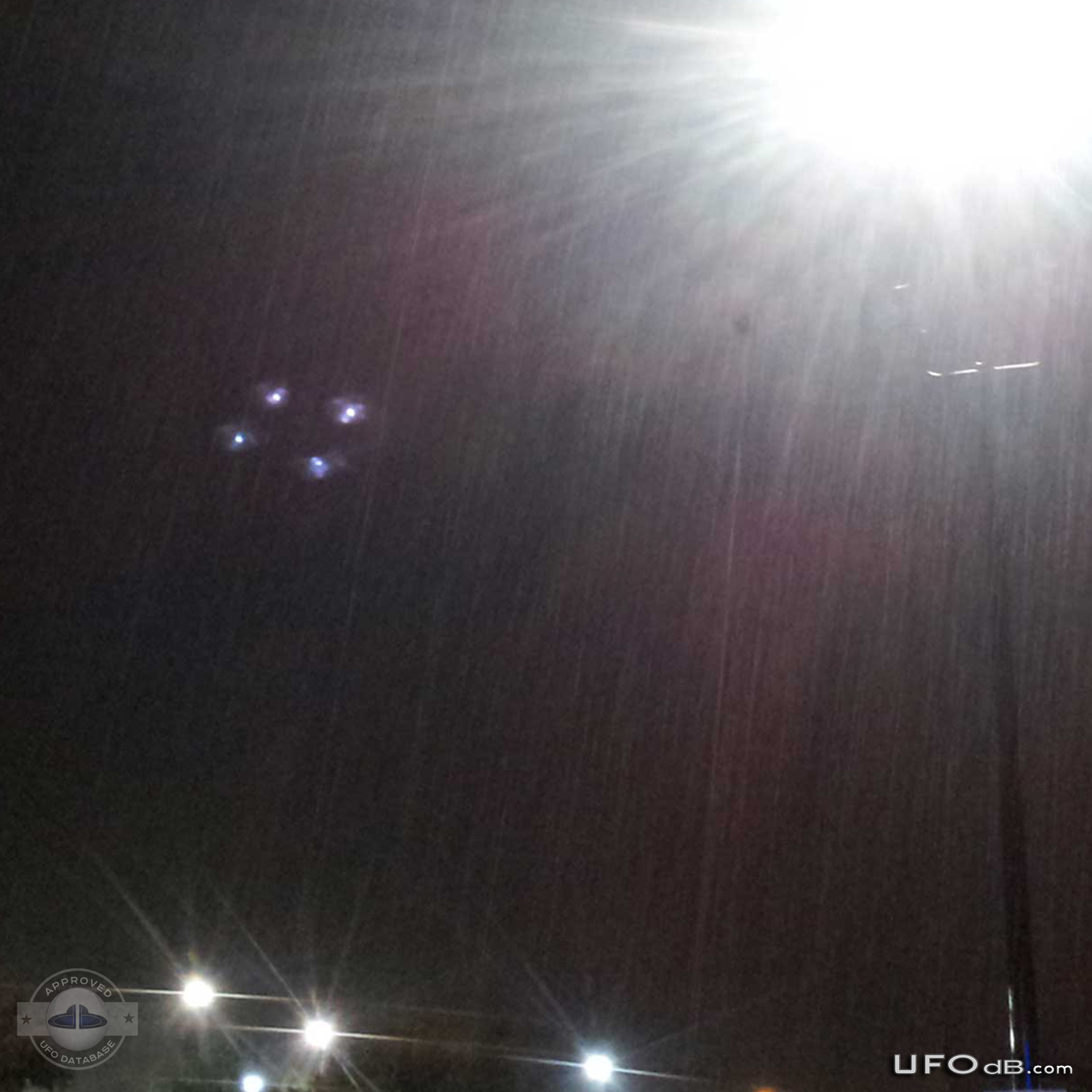 Square shaped UFO caught on picture during heavy rainfall - Rialto CA UFO Picture #384-2